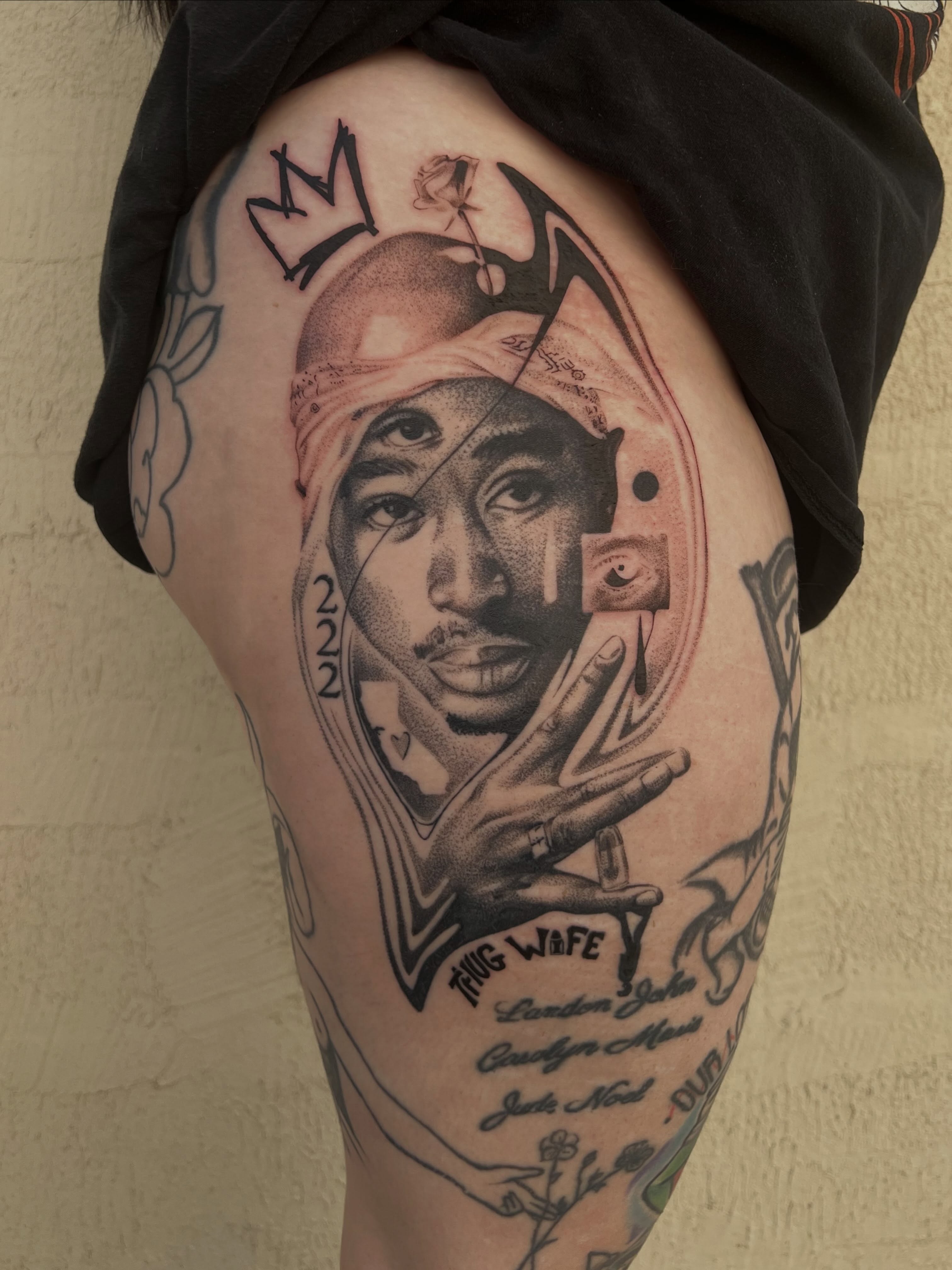Tupac Shakur realism tattoo on the thigh by Rebecca (Becca) Ray