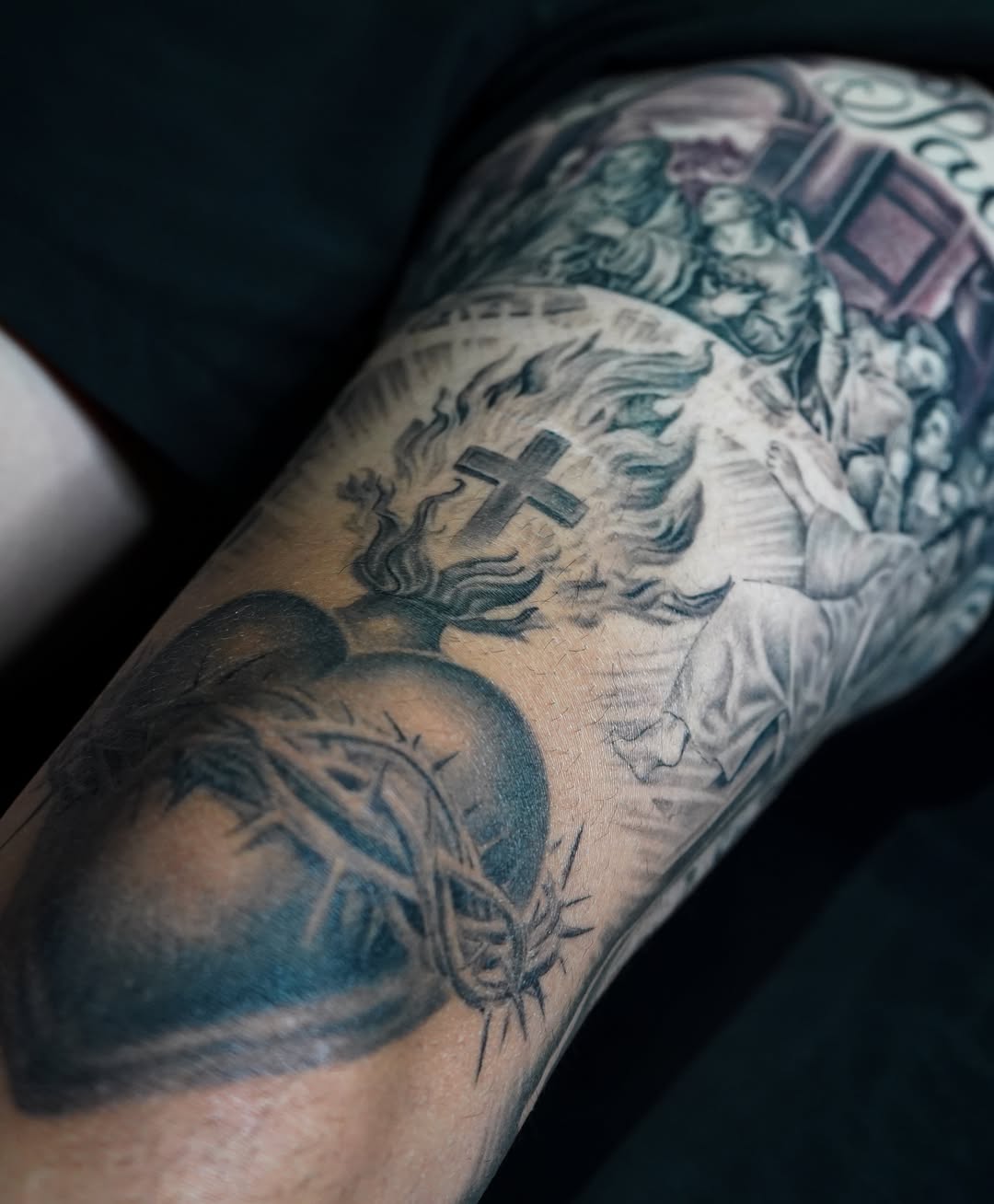 Religious scene realism tattoo on the forearm by Abel Ponce
