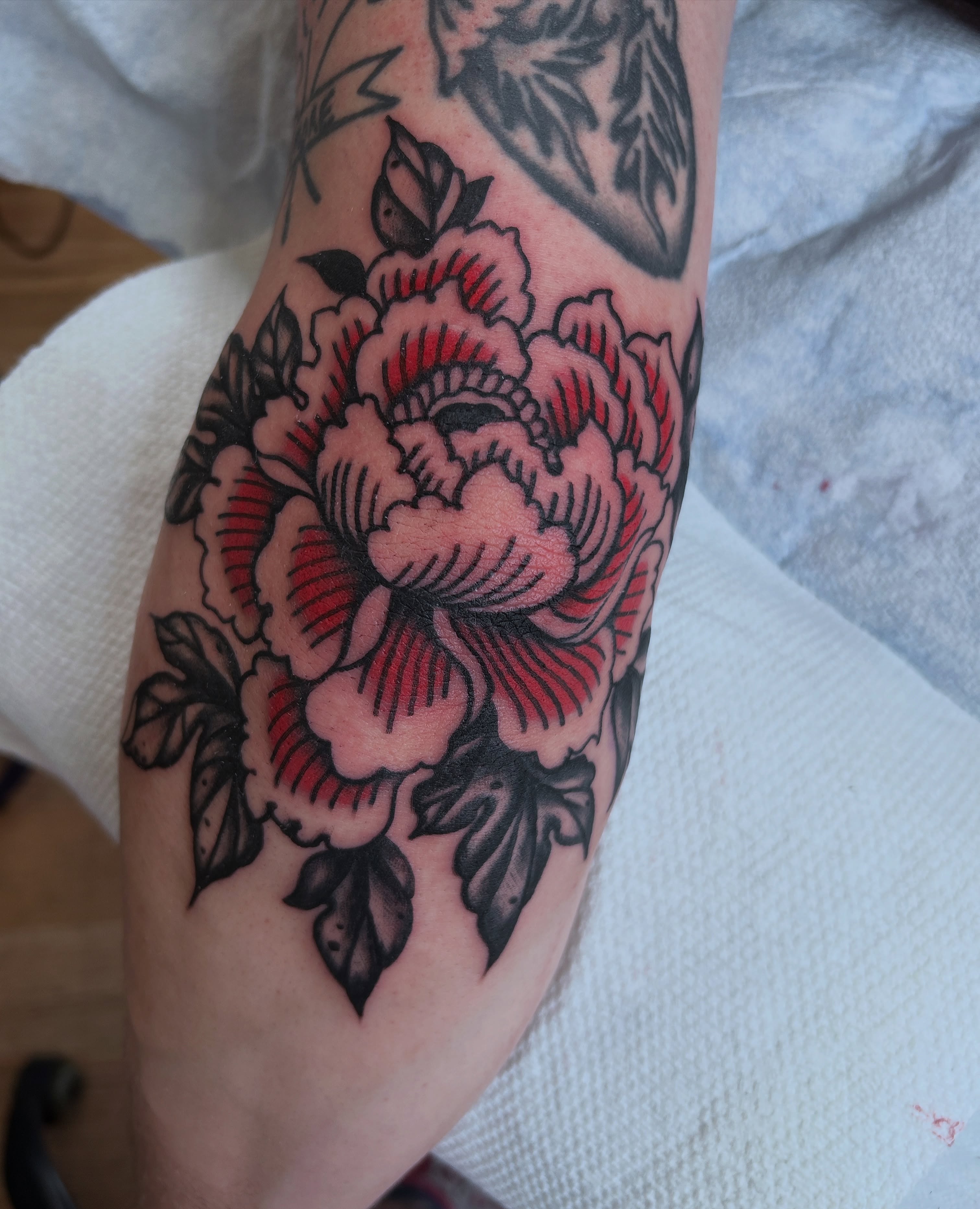 Peony American traditional tattoo on the forearm by holly danesi . philadelphia tattoo, Philadelphia, Pennsylvania