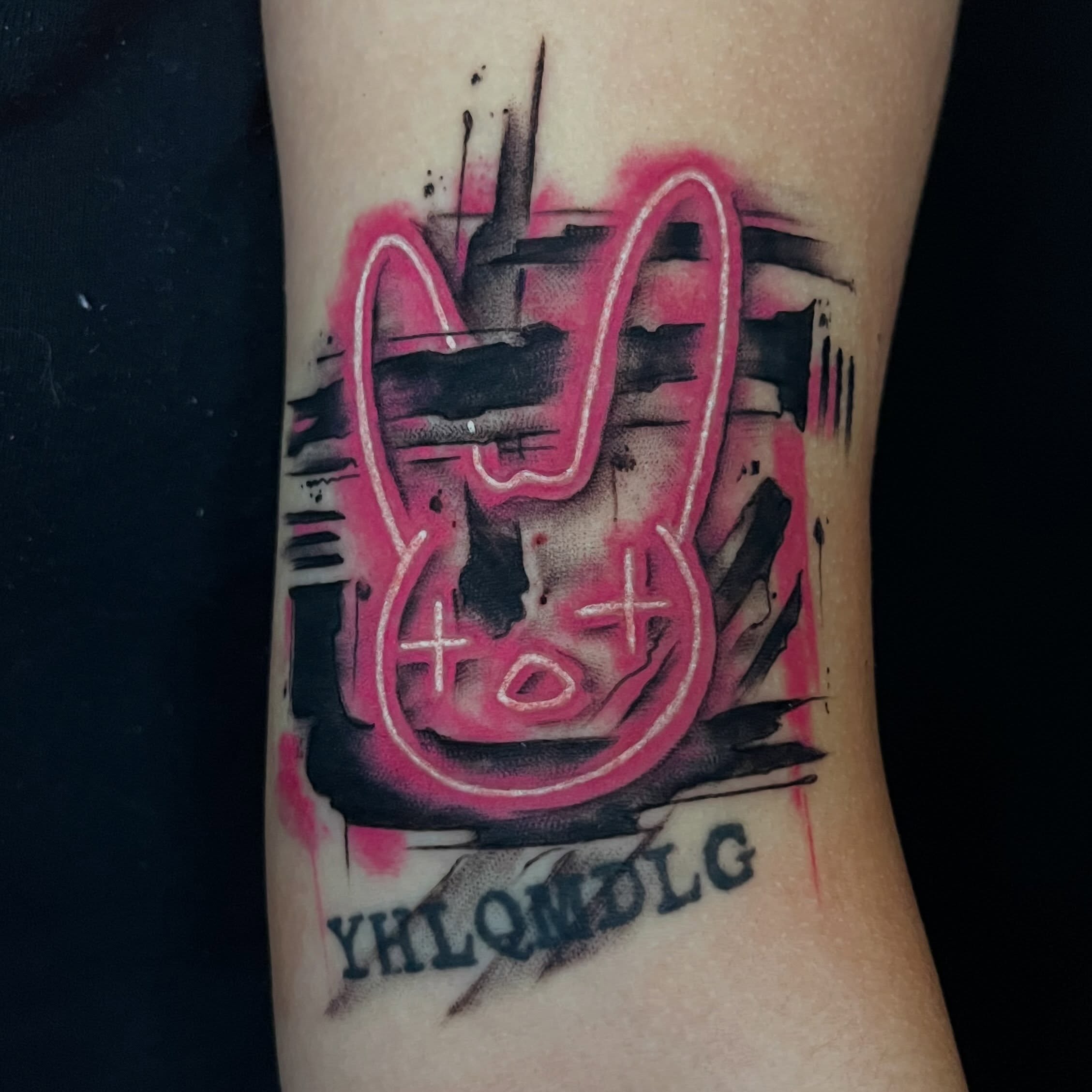 Abstract cityscape with rabbit dotwork tattoo on the forearm by Cuda