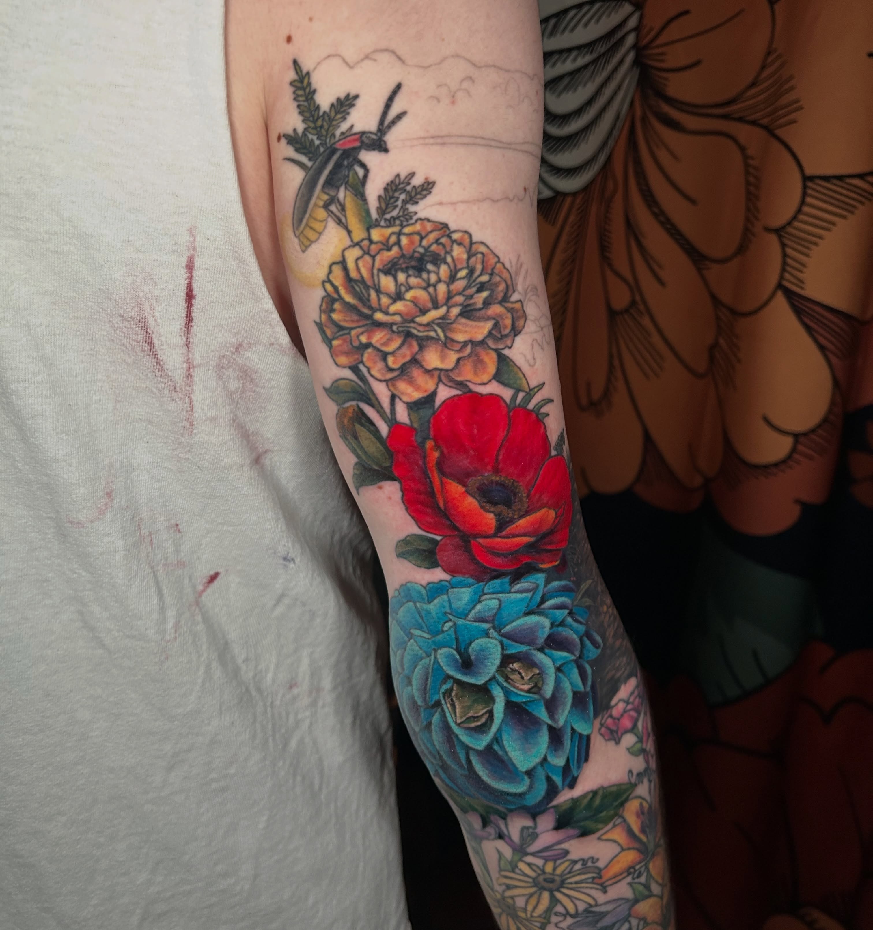 Floral bouquet new school tattoo on the forearm by Paisley Diaz, Lombard, Illinois