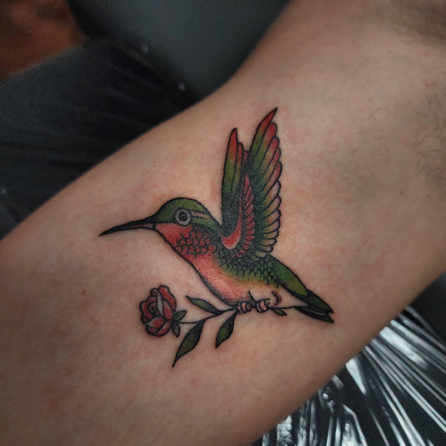 Hummingbird and rose American traditional tattoo on the forearm by Meggalodon 🖤 (Meggan Rose)