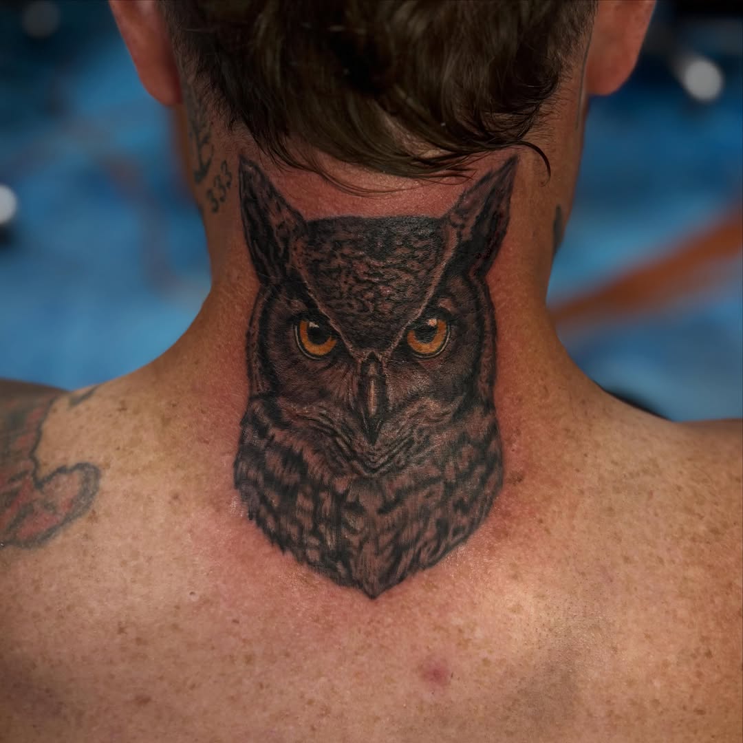 Owl realism tattoo on the neck by Cam Sykes