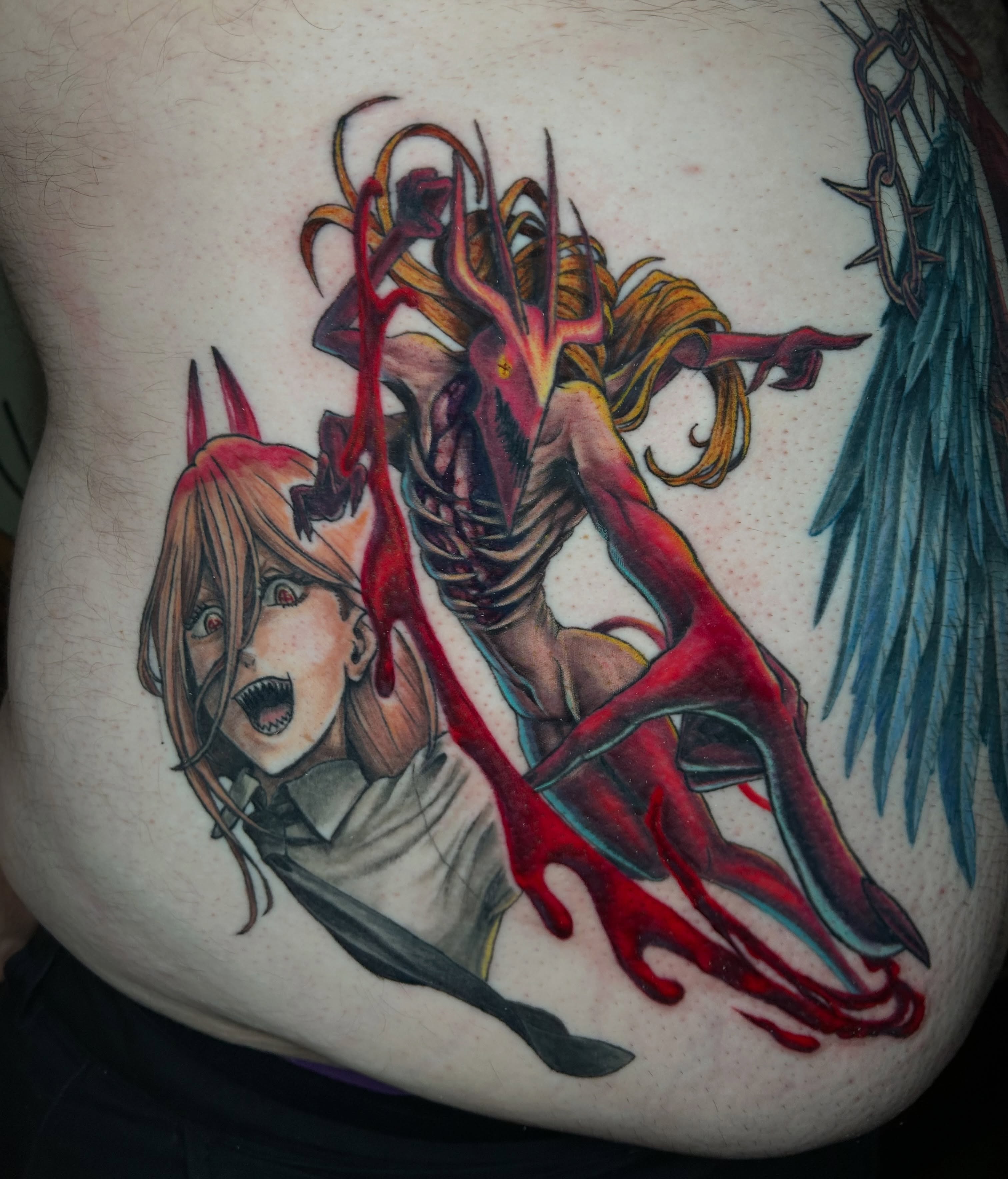 Demon and girl anime tattoo on the torso by Paisley Diaz, Lombard, Illinois
