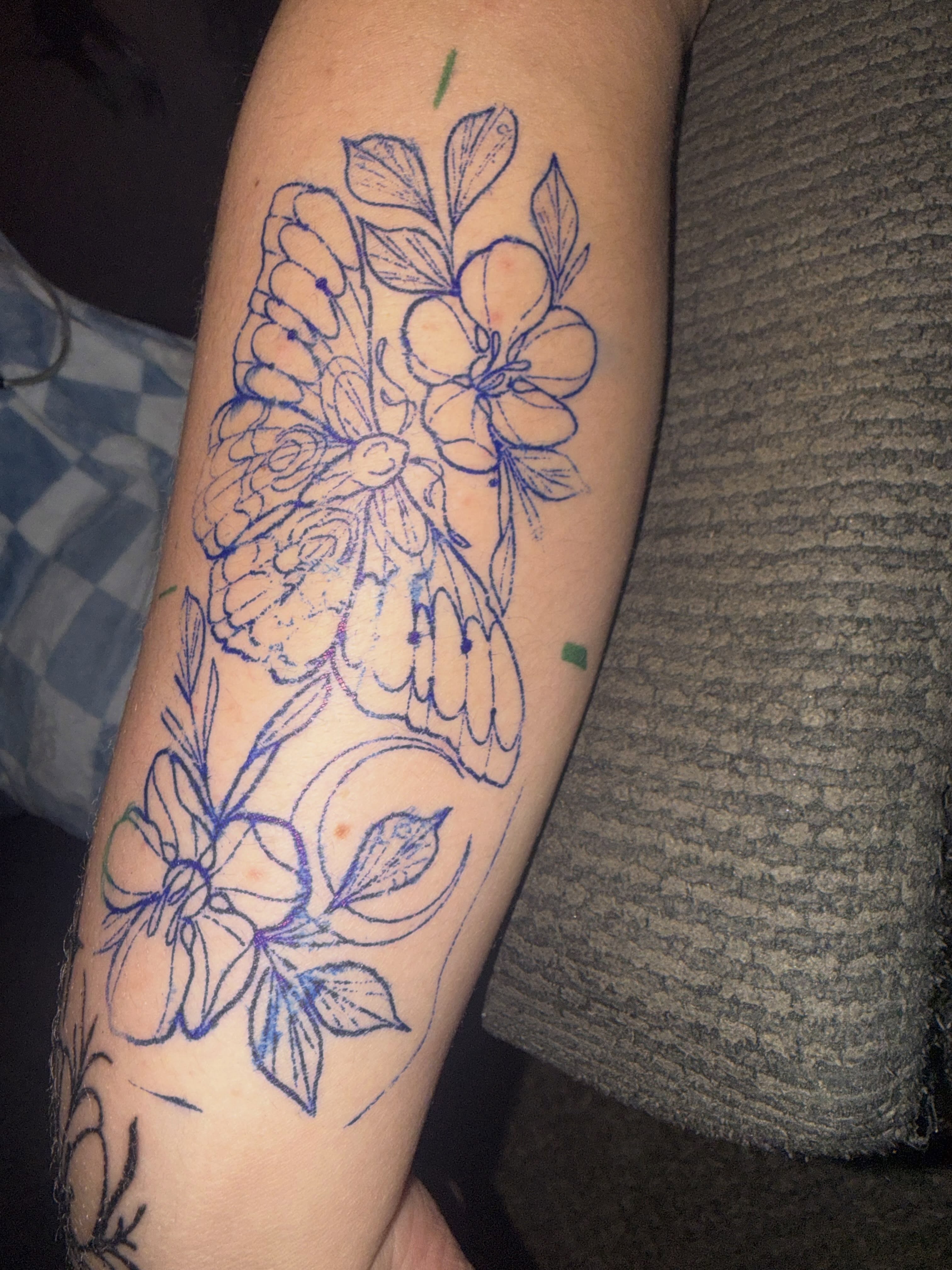 Floral arrangement fine line tattoo on the forearm by Tatz By Benji