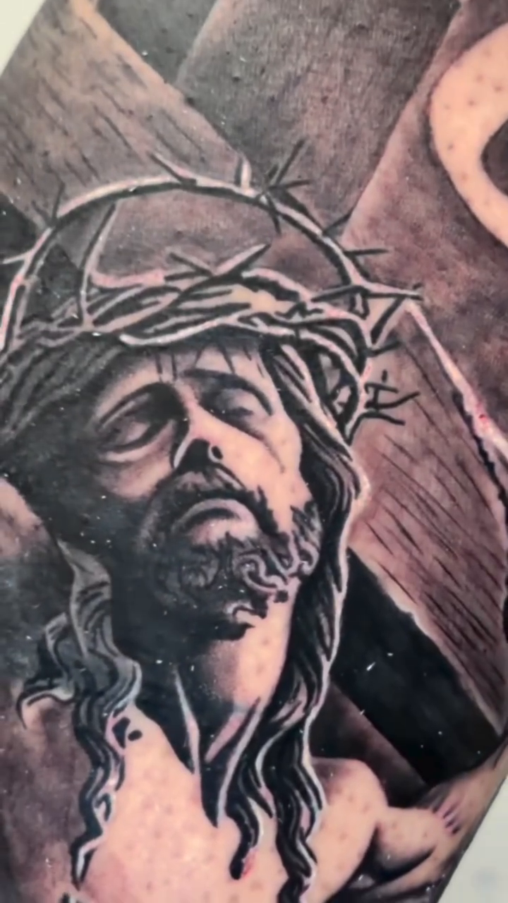 Jesus on the cross realism tattoo by caleb coley