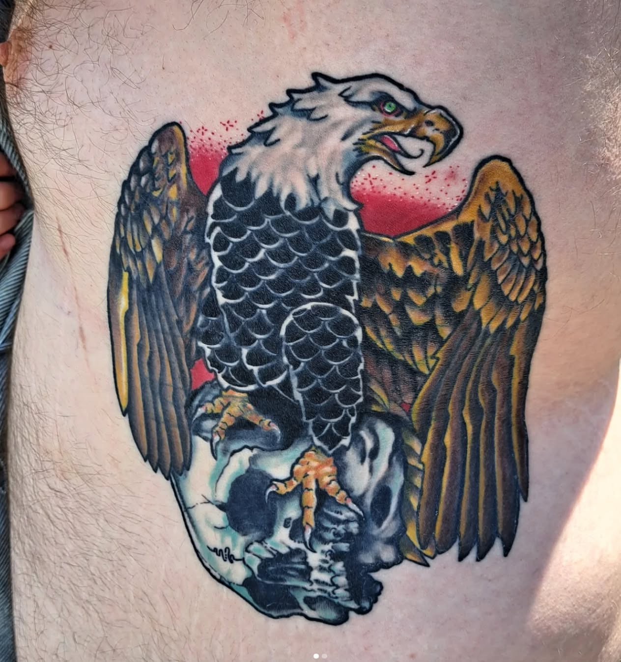 Eagle American traditional tattoo on the thigh by Jake Mincey
