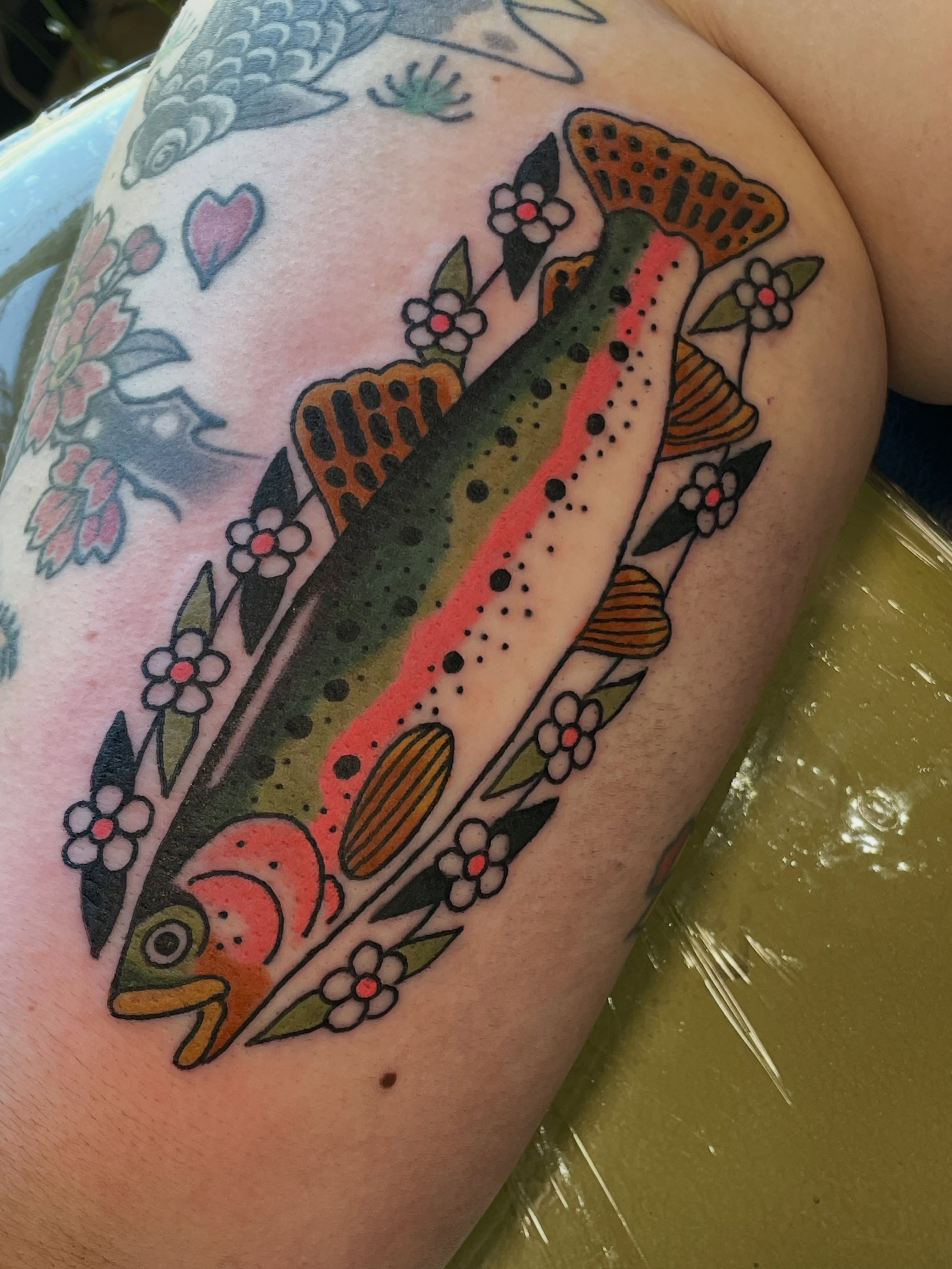 Rainbow trout dotwork tattoo on the thigh by @pizzabref