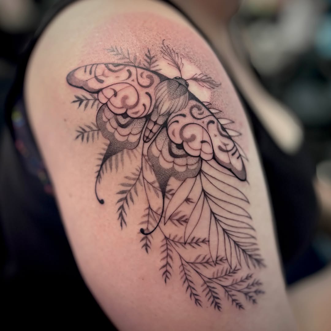 Moth and leaves dotwork tattoo on the shoulder by Victoria Lamorte