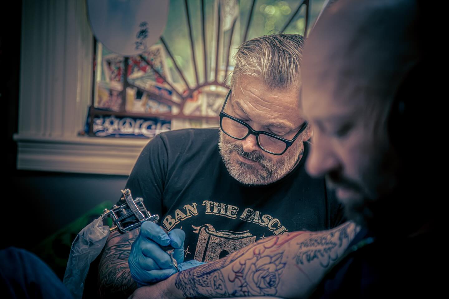 Tattoo artist American traditional tattoo on the upper arm by Dan Gilsdorf, Portland, Oregon