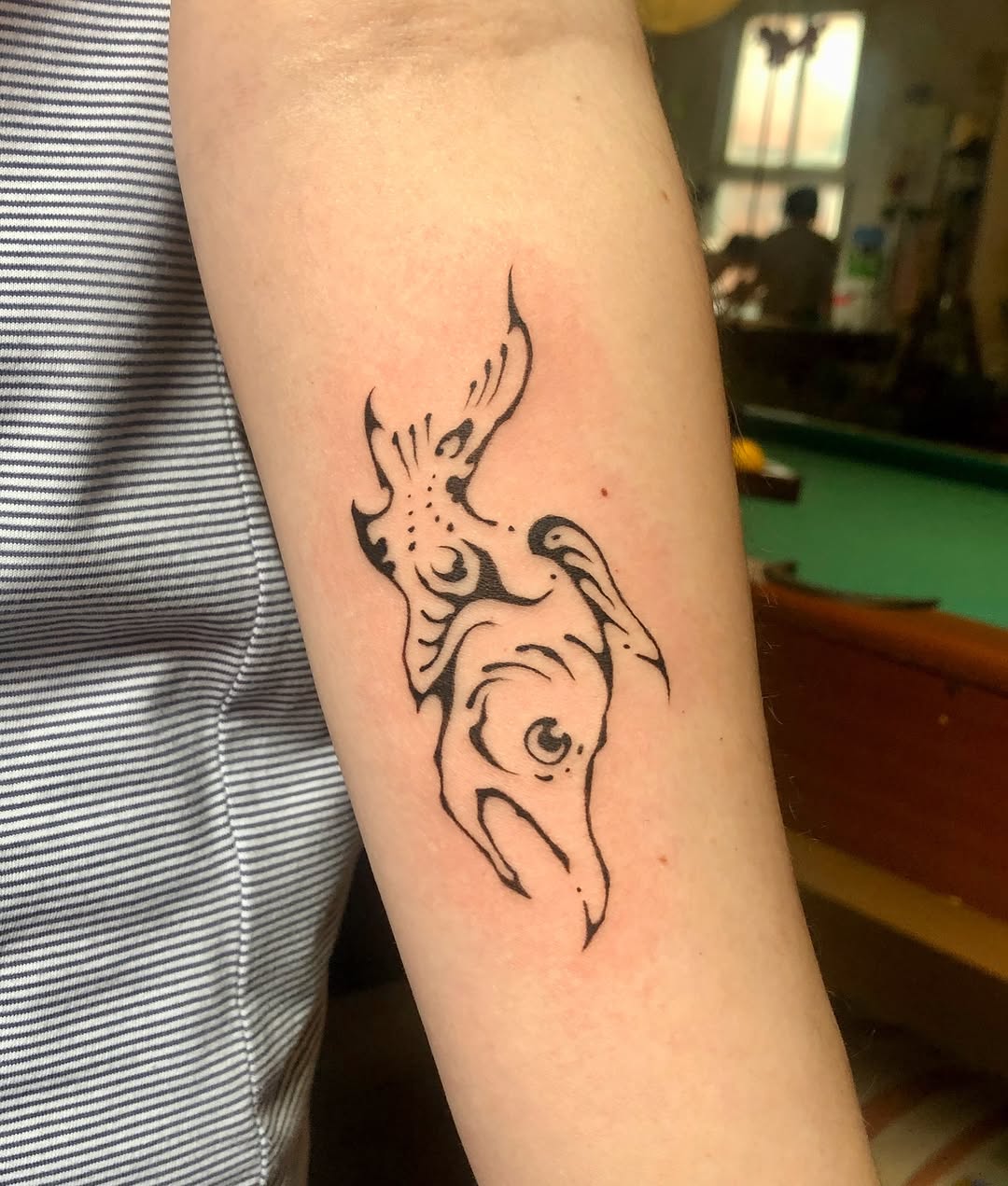 Abstract creature with eye cyber sigilism tattoo on the forearm by thalia