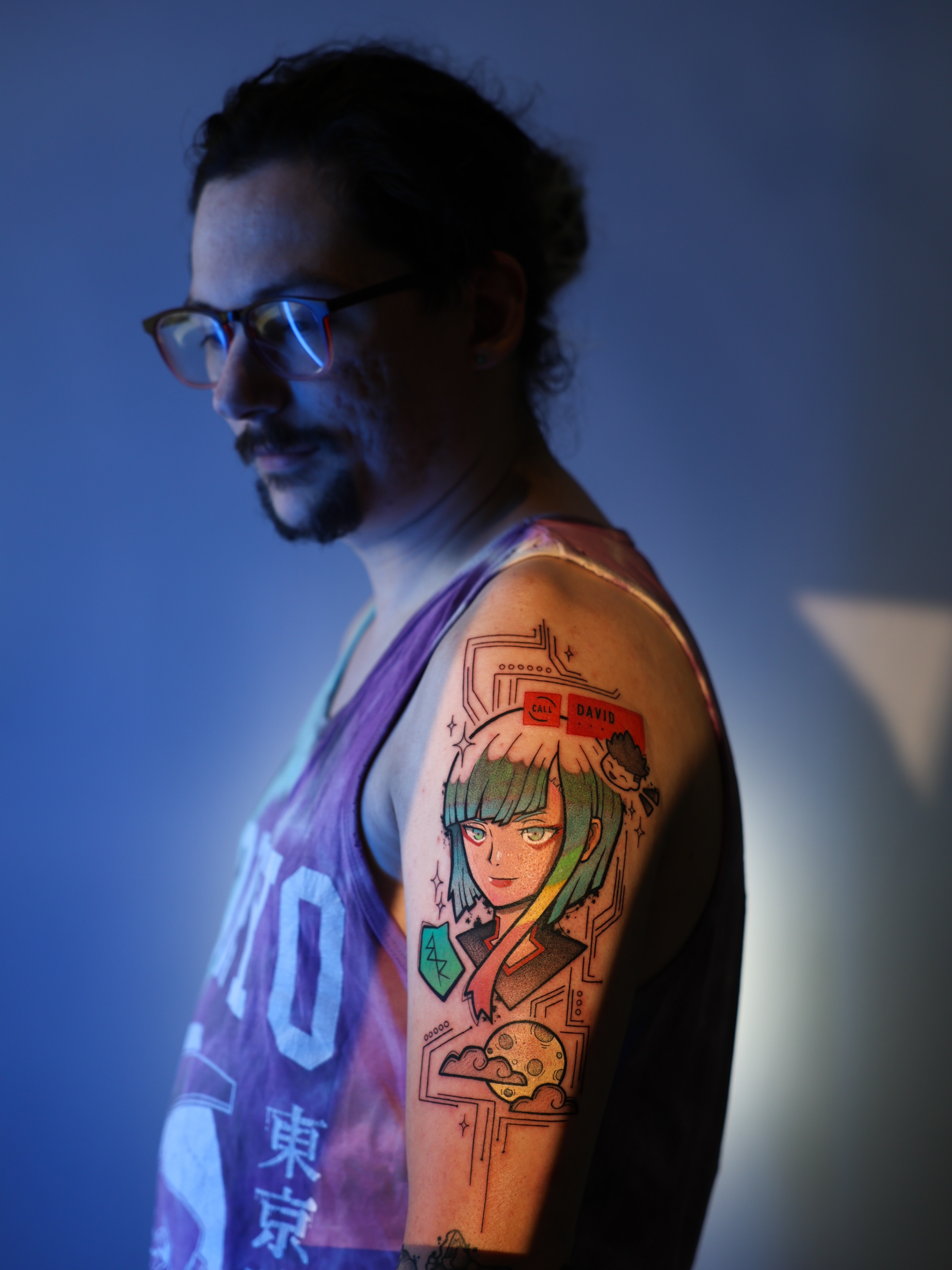 Anime character anime tattoo on the upper arm by Derek Foferek, Charlotte, North Carolina