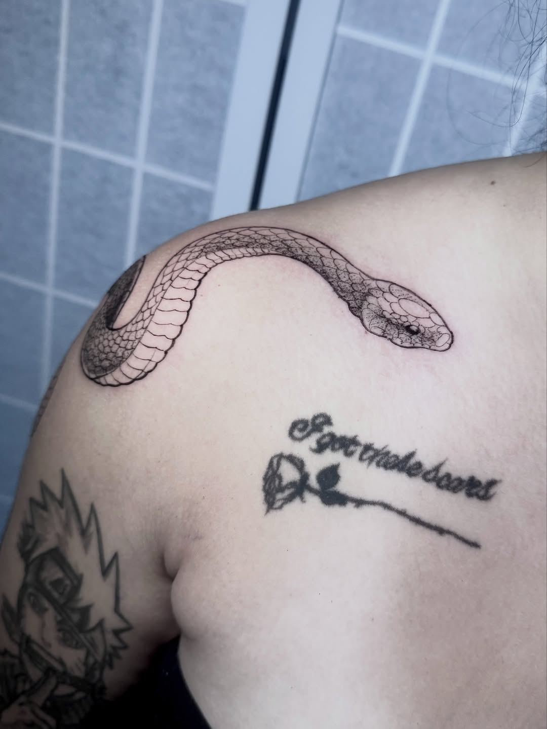 Snake fine line tattoo on the shoulder by โญ๐ฌ๐ฒ๐ฏ๐ฑ๐ซ๐ข๐ถ