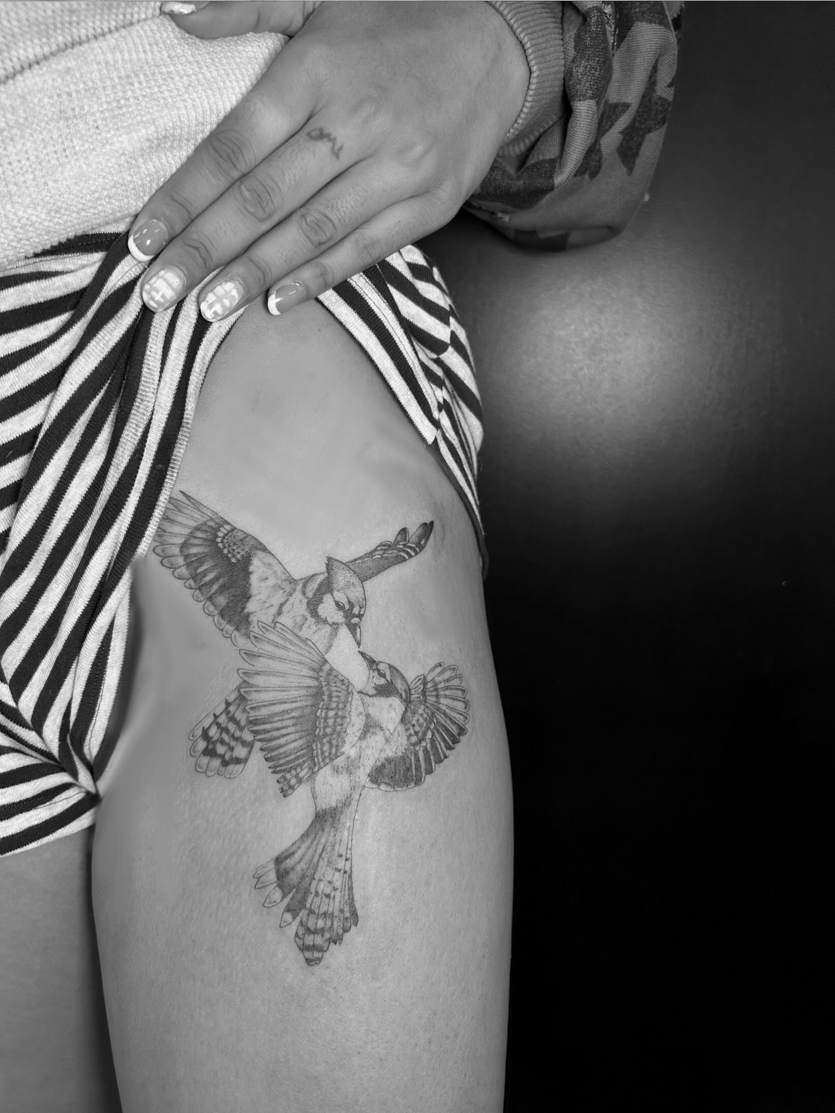 Birds realism tattoo on the thigh by L i v π Tattoo Artist. AMITY TATTOO
