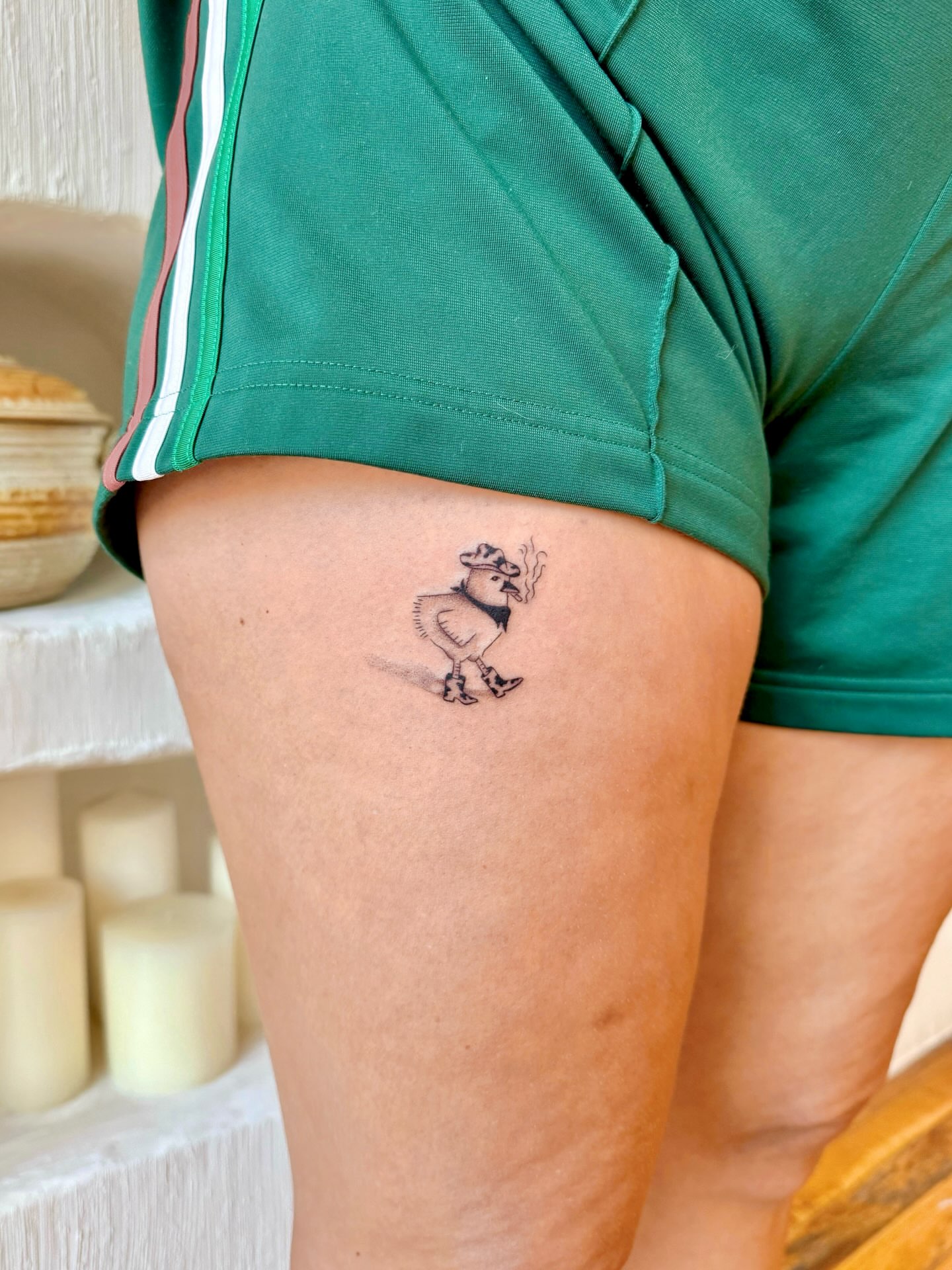 Chicken black and grey tattoo on the thigh by Shilo Gold 🍒
