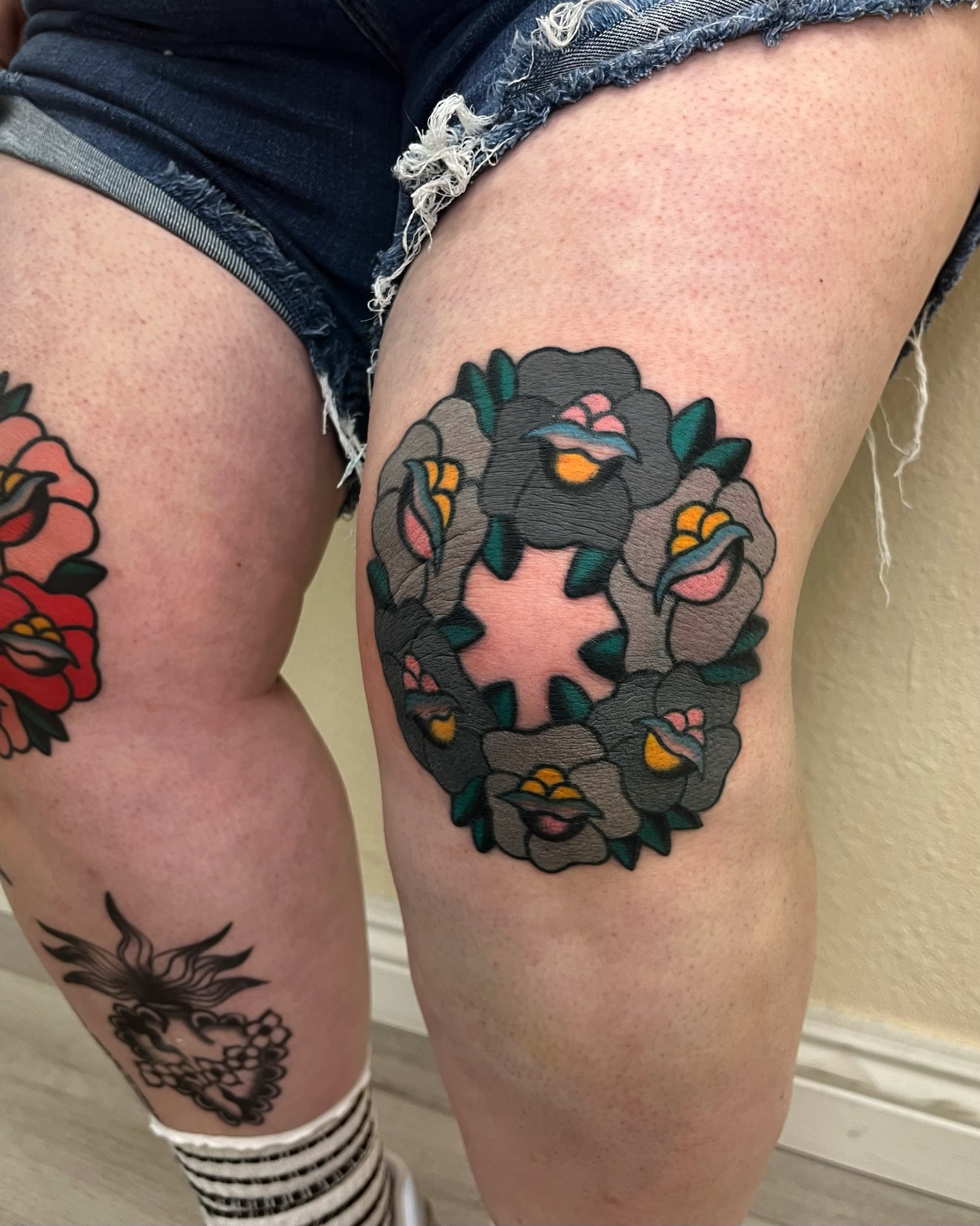 Flower wreath American traditional tattoo on the thigh by Tattoo Dust ☻ Los Angeles