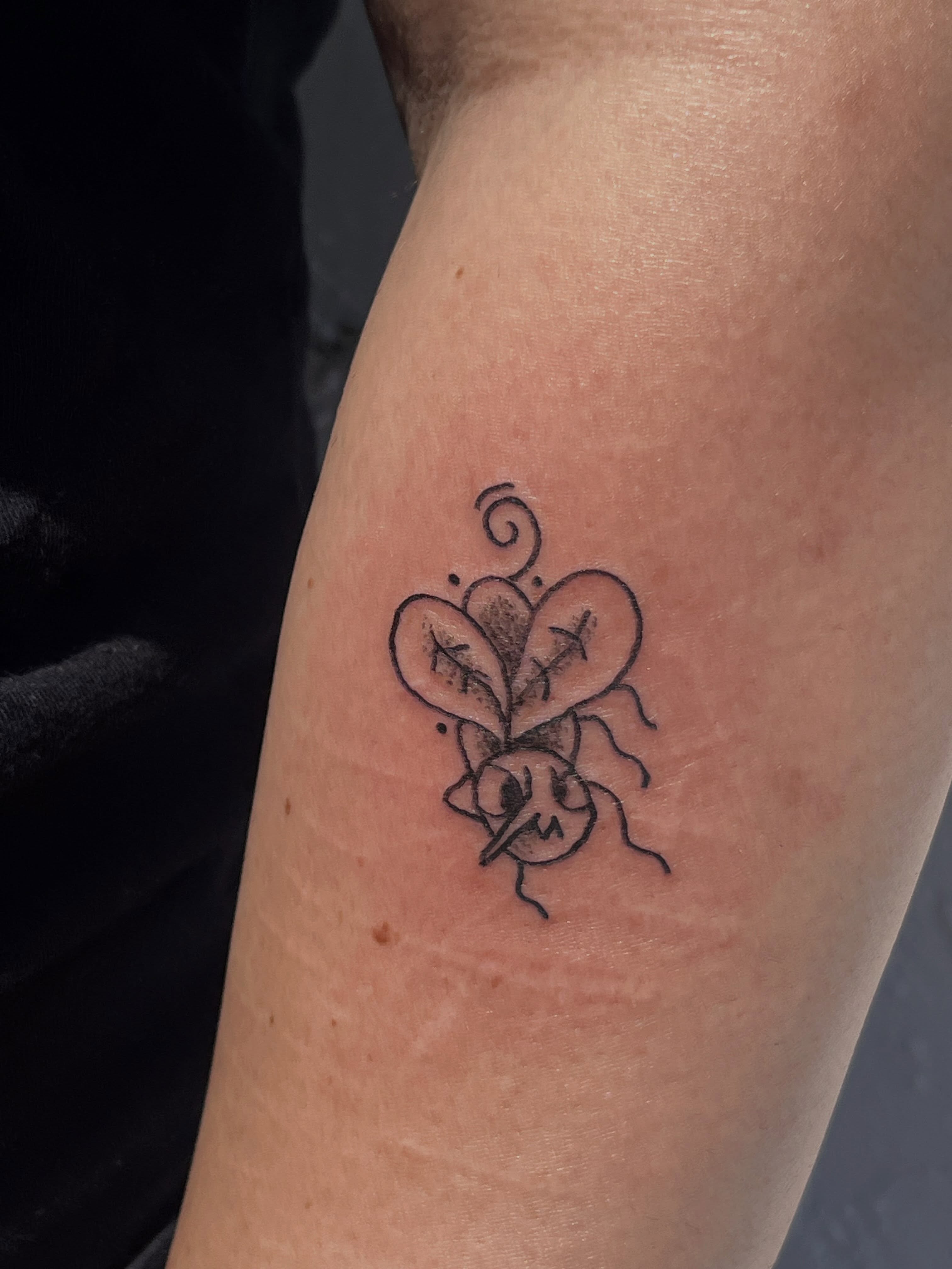 Heart with cross black and grey tattoo on the forearm by luce elias :