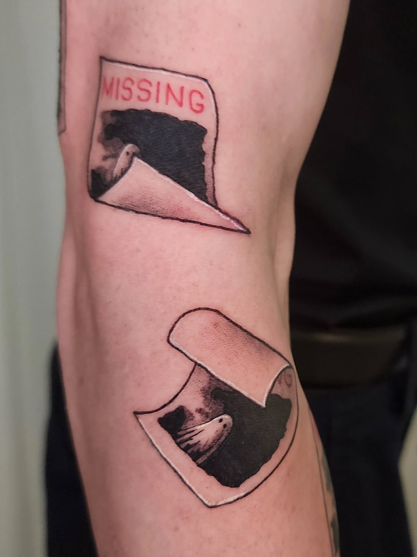Missing poster black and grey tattoo on the forearm by Lindsey Andrew, Englewood, Colorado