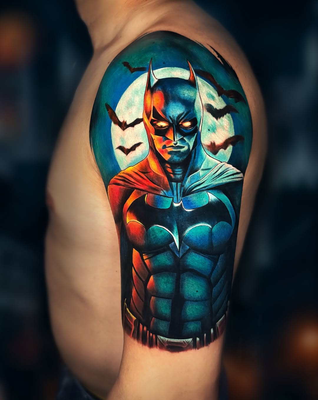 Batman portrait new school tattoo on the upper arm by Kaly, Manhattan, NYC