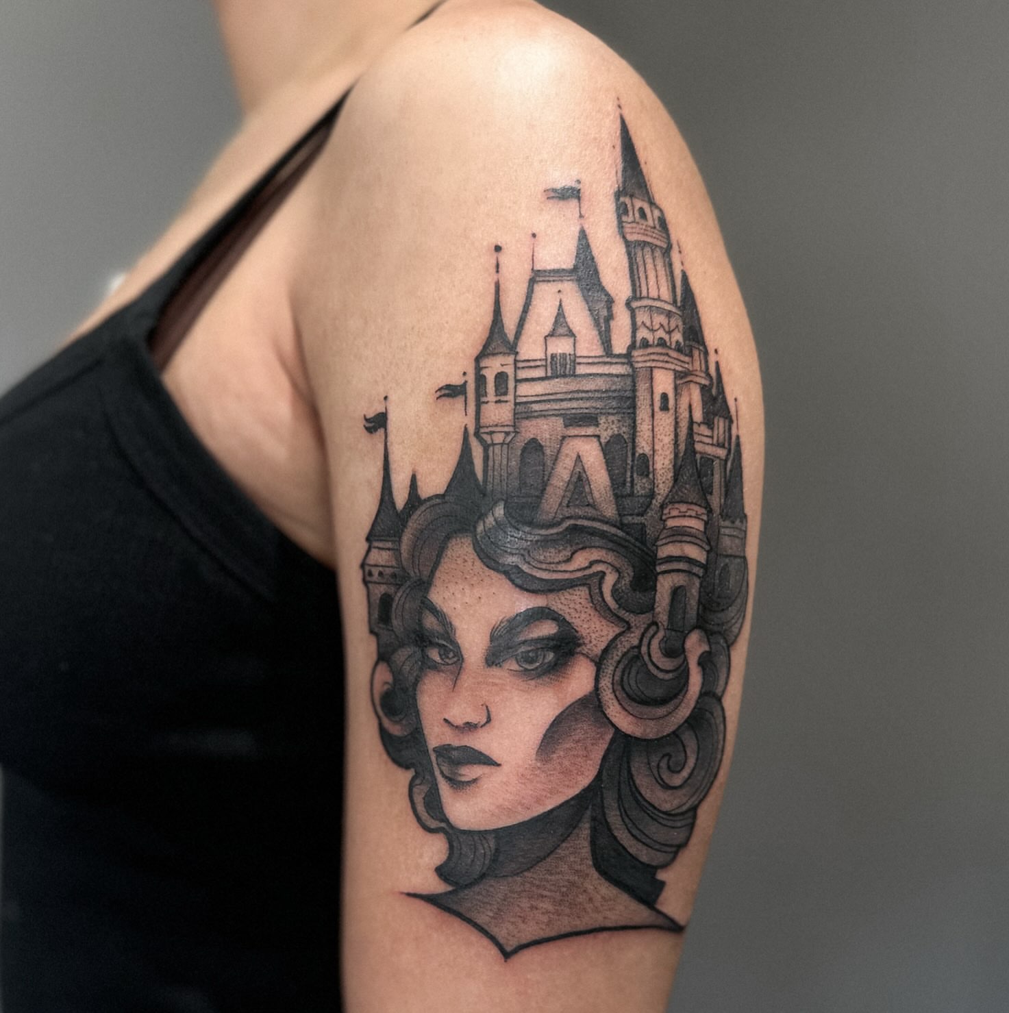 Castle and woman dotwork tattoo on the shoulder by Elvira Savchuk