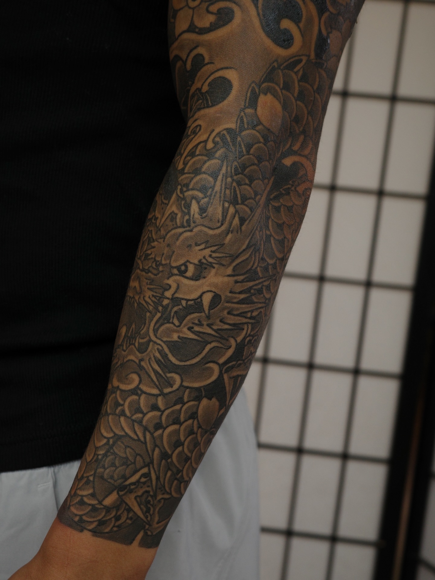 Dragon japanese irezumi tattoo on the forearm by Innokenty Meshchakov, Portland, Oregon