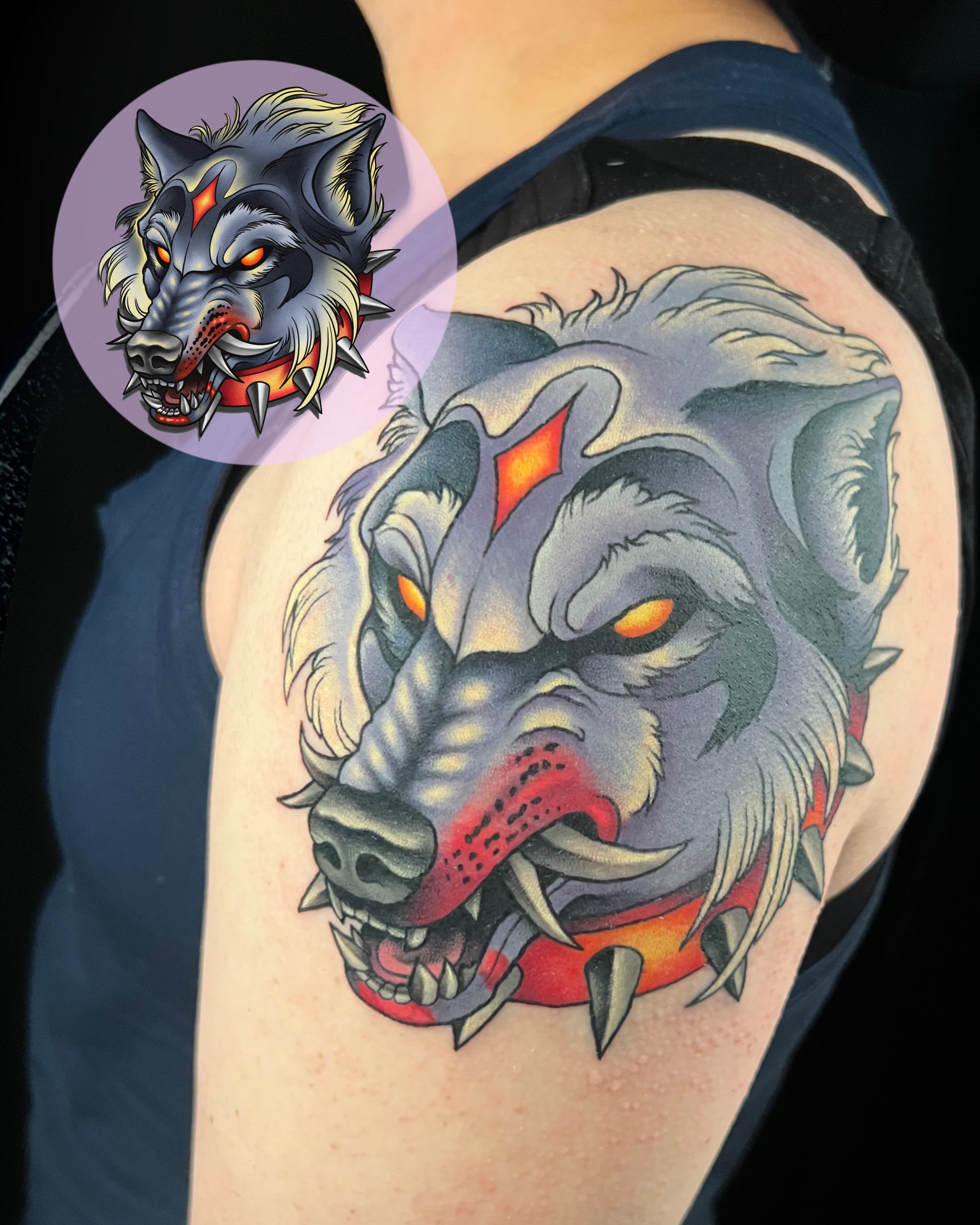 Wolf American traditional tattoo on the shoulder by Jade Lewis