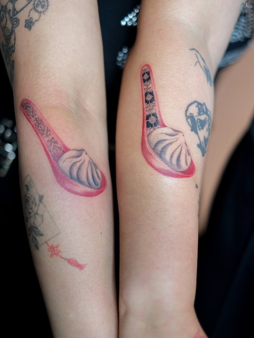 Dim sum dumplings on spoons minimalist tattoo on the forearm by Jinz