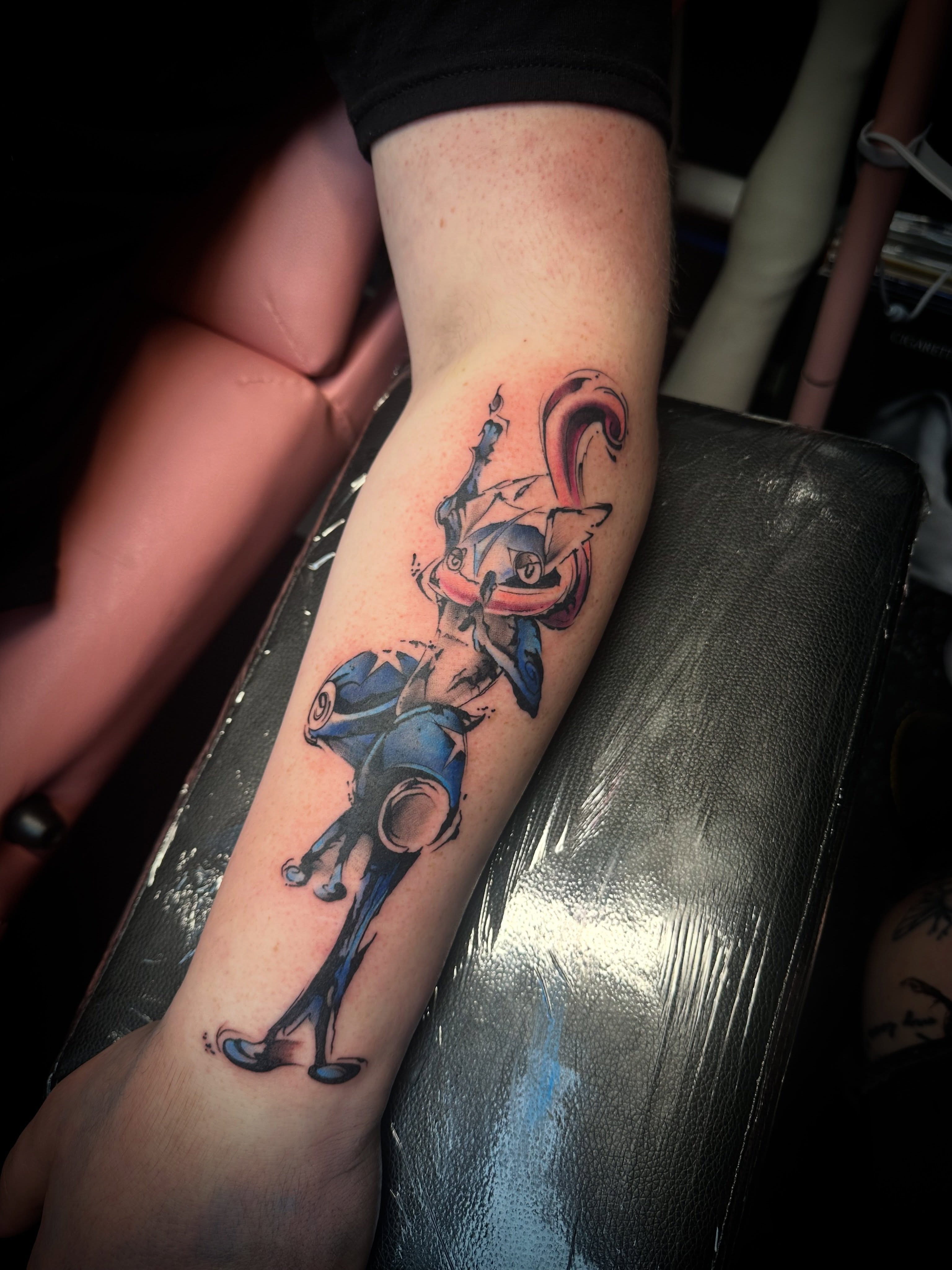 Cat-like creature dotwork tattoo on the forearm by Kassie Perian