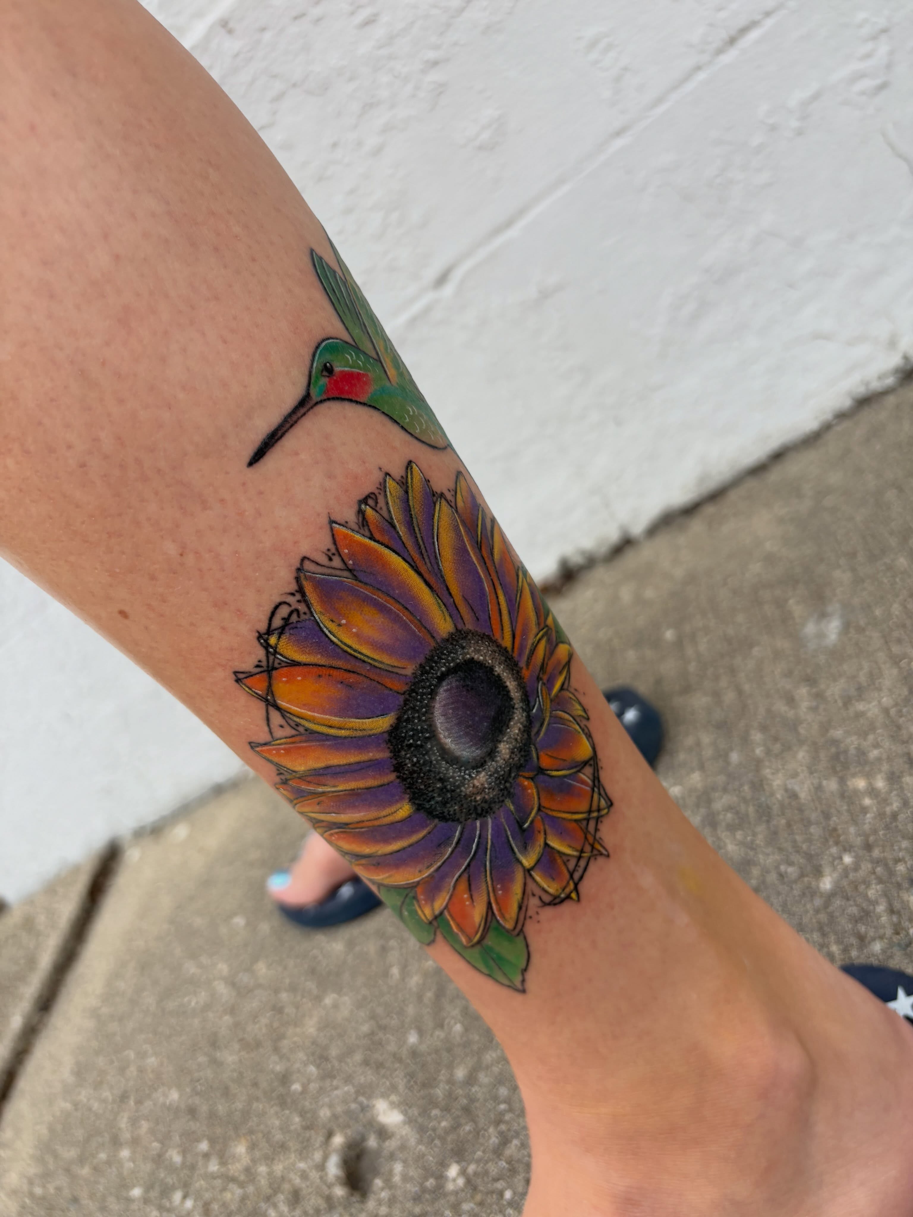 Sunflower and hummingbird new school tattoo on the forearm by Andrea 🎨🖌