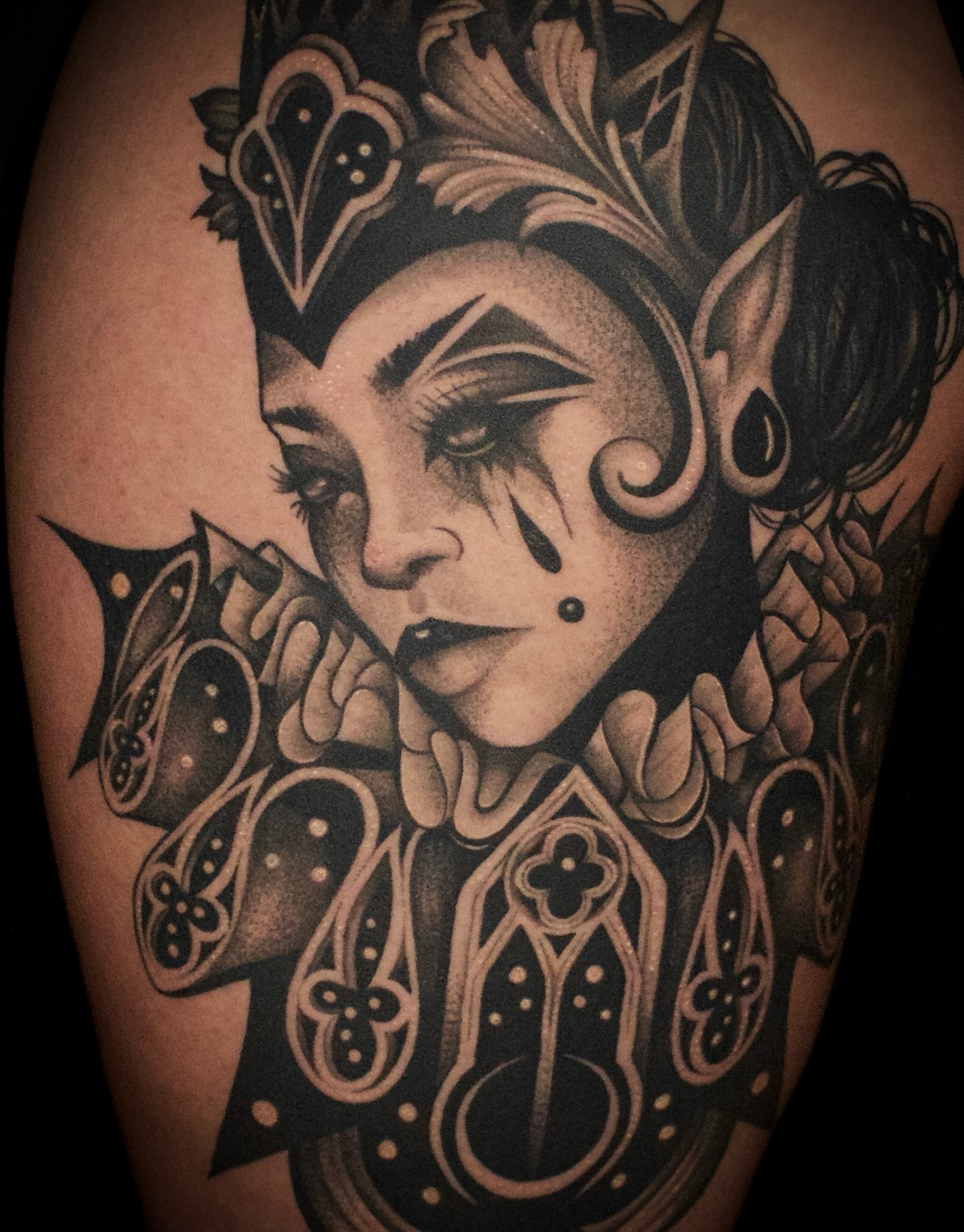 Woman with crown dark realism tattoo on the shoulder by Galen