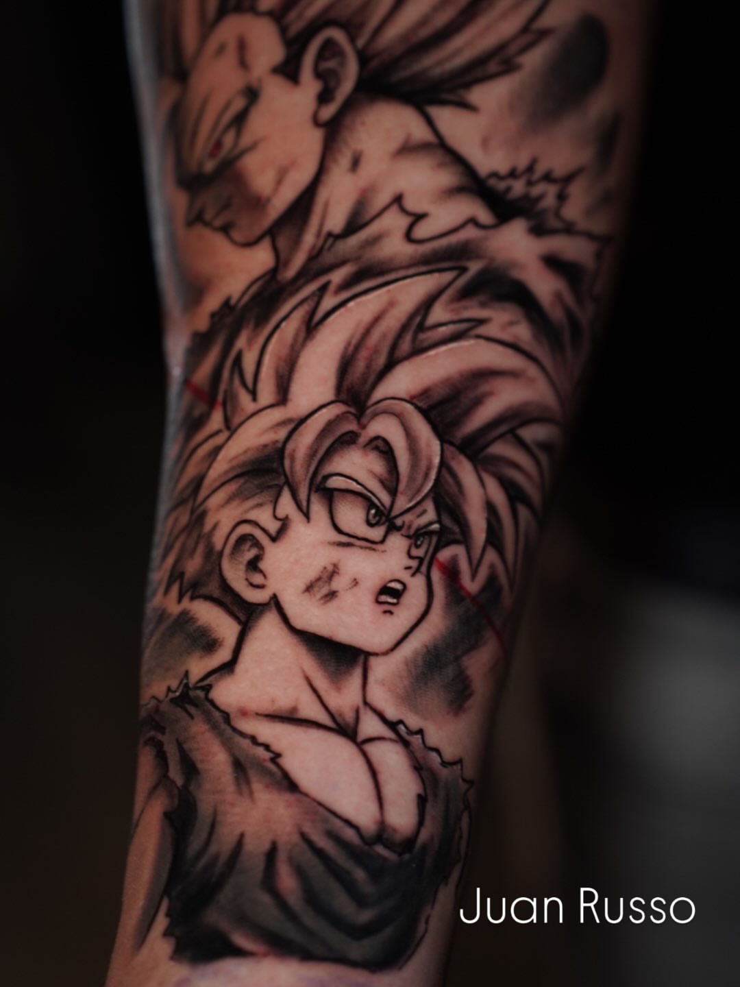 Goku anime tattoo on the forearm by Juan Russo