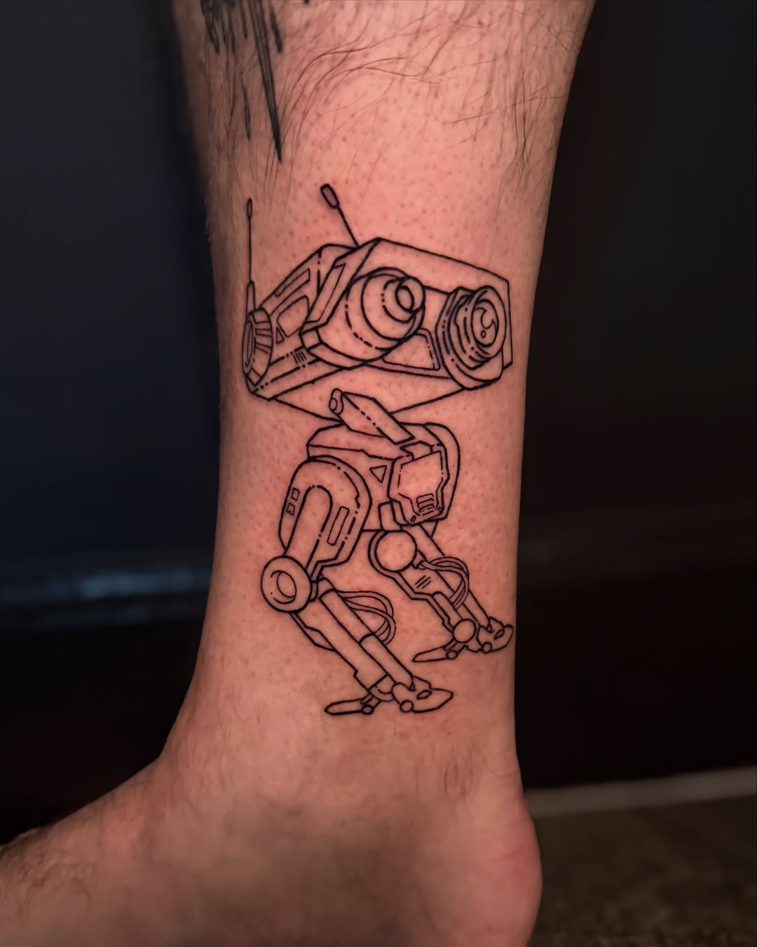 Robot geometric tattoo on the forearm by Ivy-Jade Edwards, Memphis, Tennessee