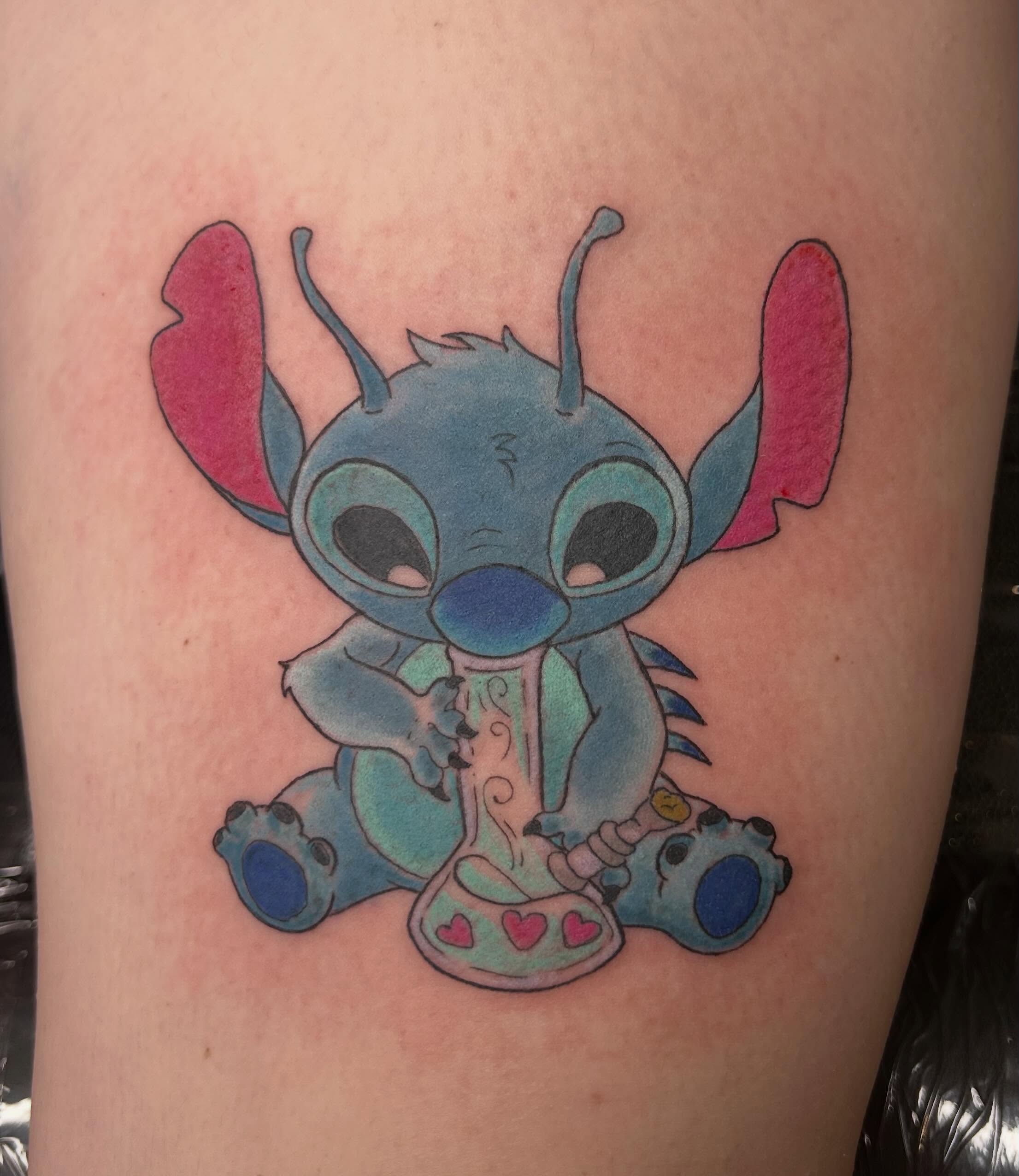 Stitch new school tattoo on the thigh by Reilley Earles