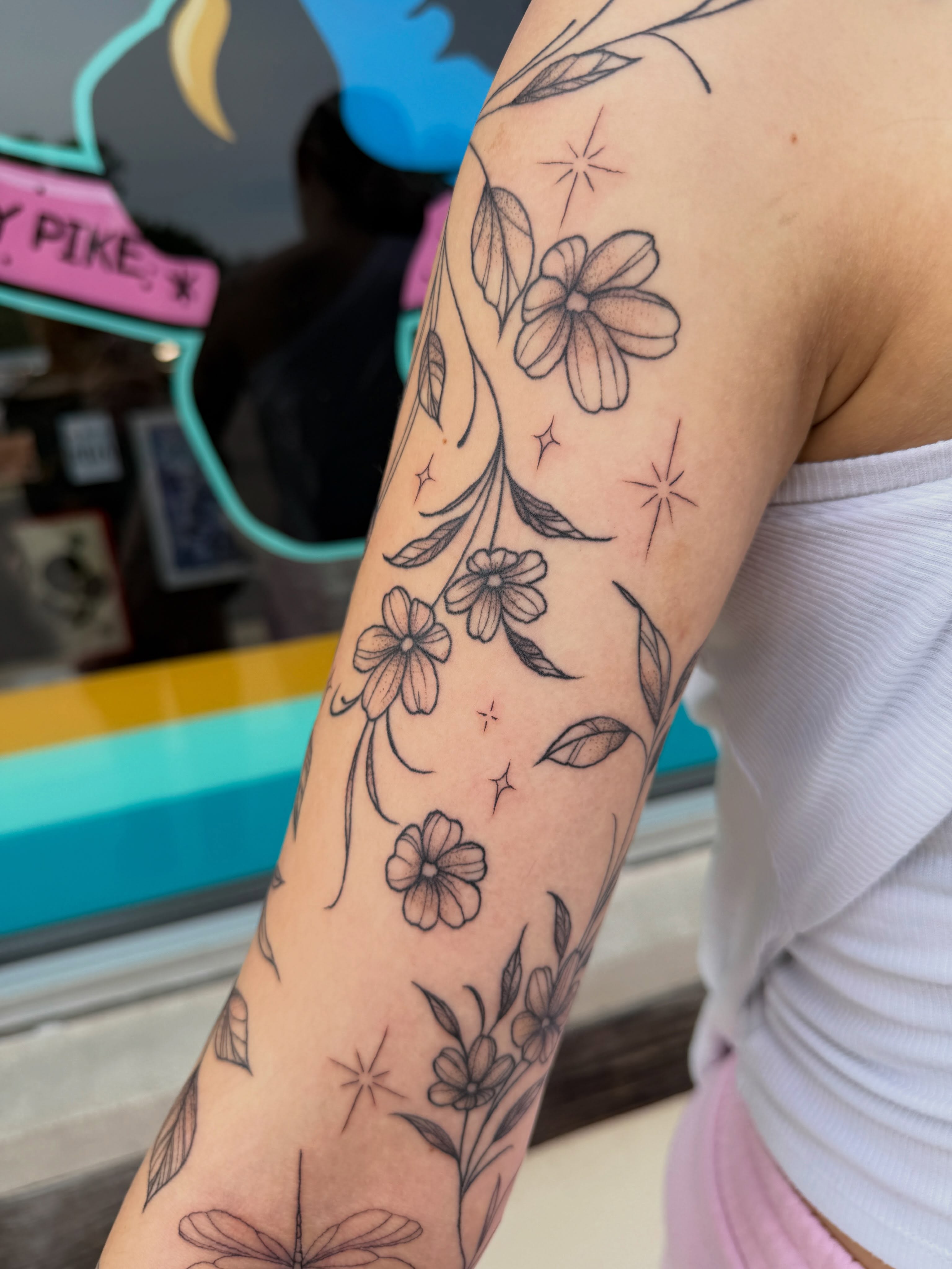 Floral bouquet fine line tattoo on the forearm by 𝕯𝖆𝖓𝖎