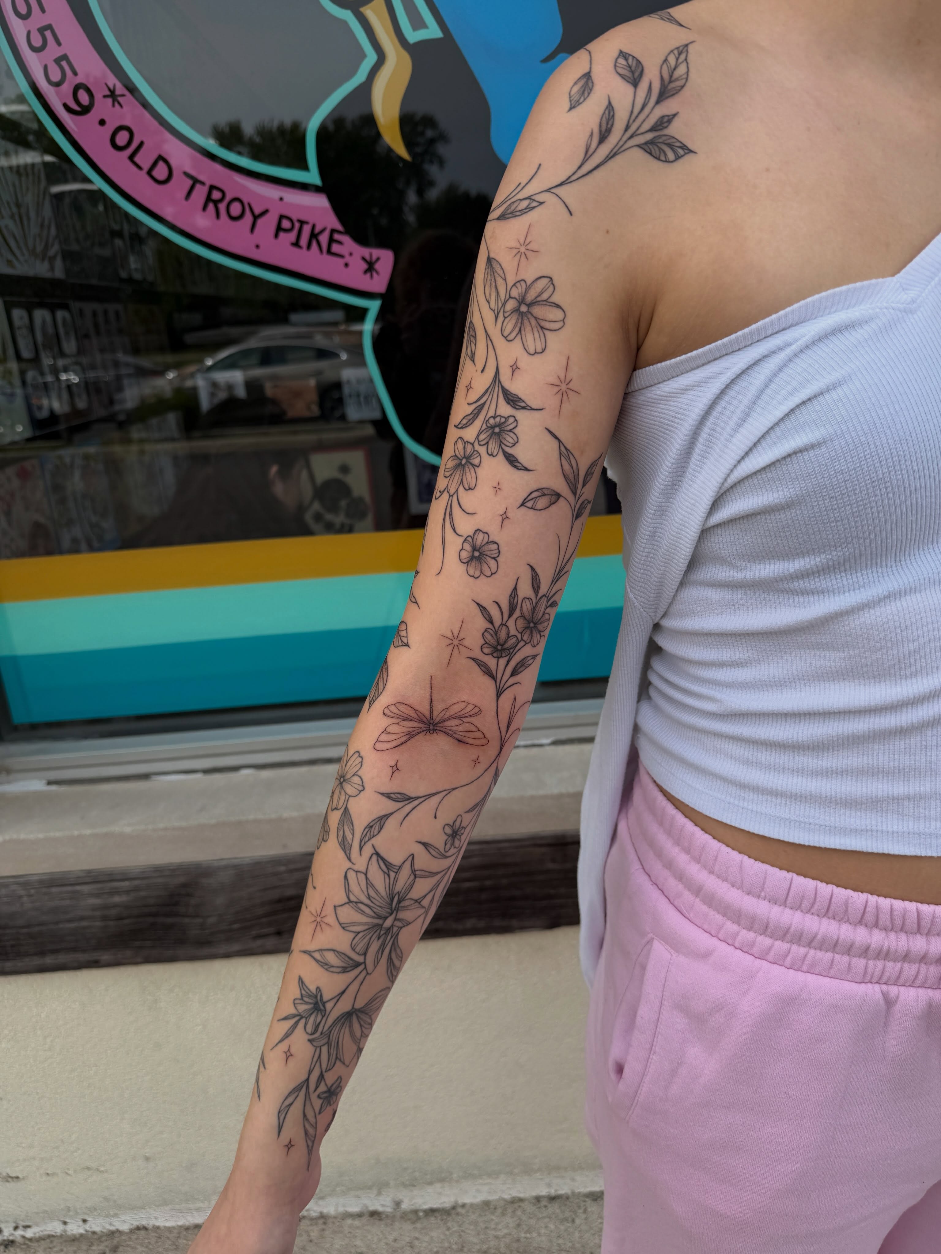 Floral design black and grey tattoo on the forearm by 𝕯𝖆𝖓𝖎