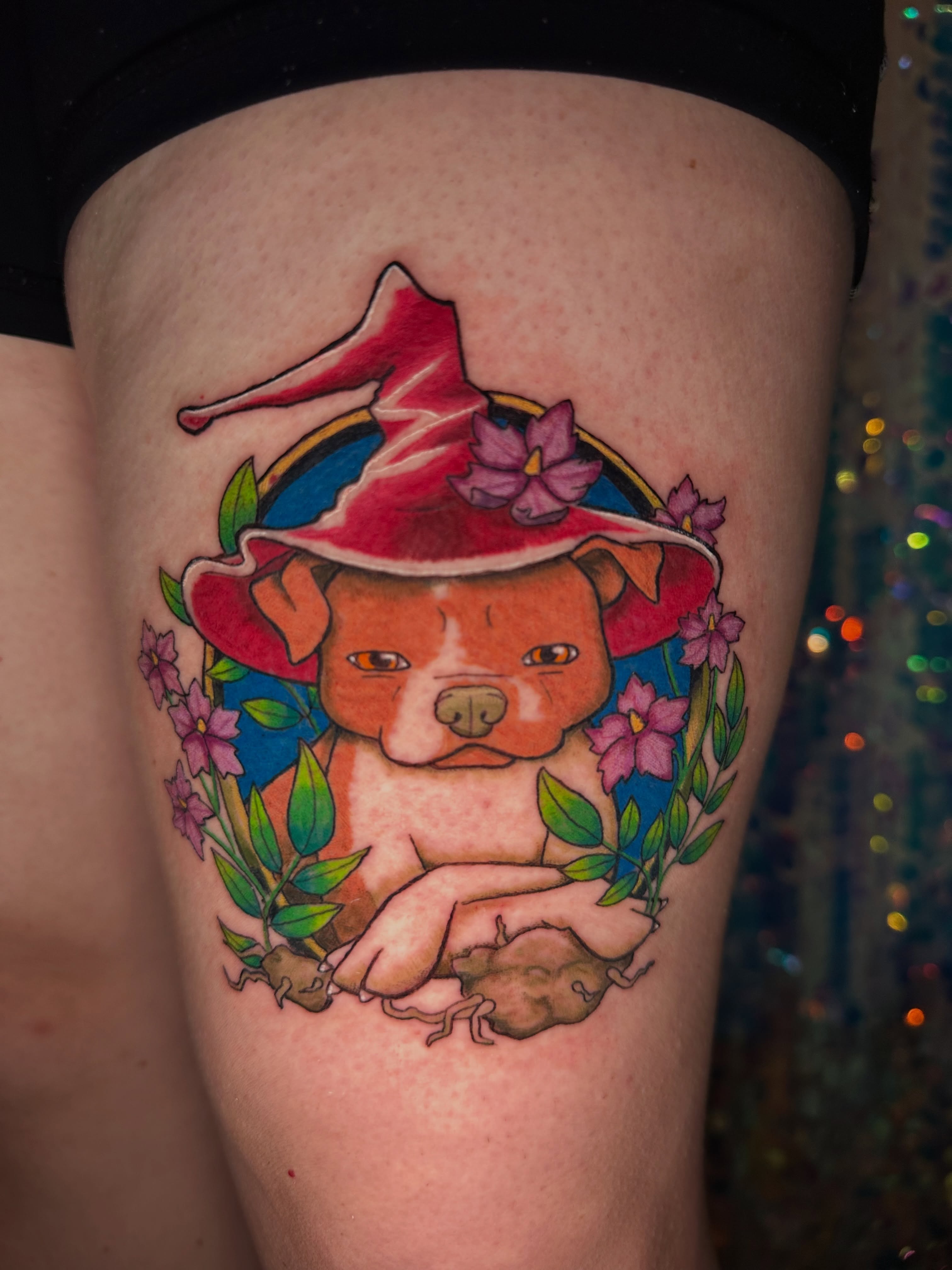 Dog wearing wizard hat new school tattoo on the thigh by Sunny, Austin, Texas