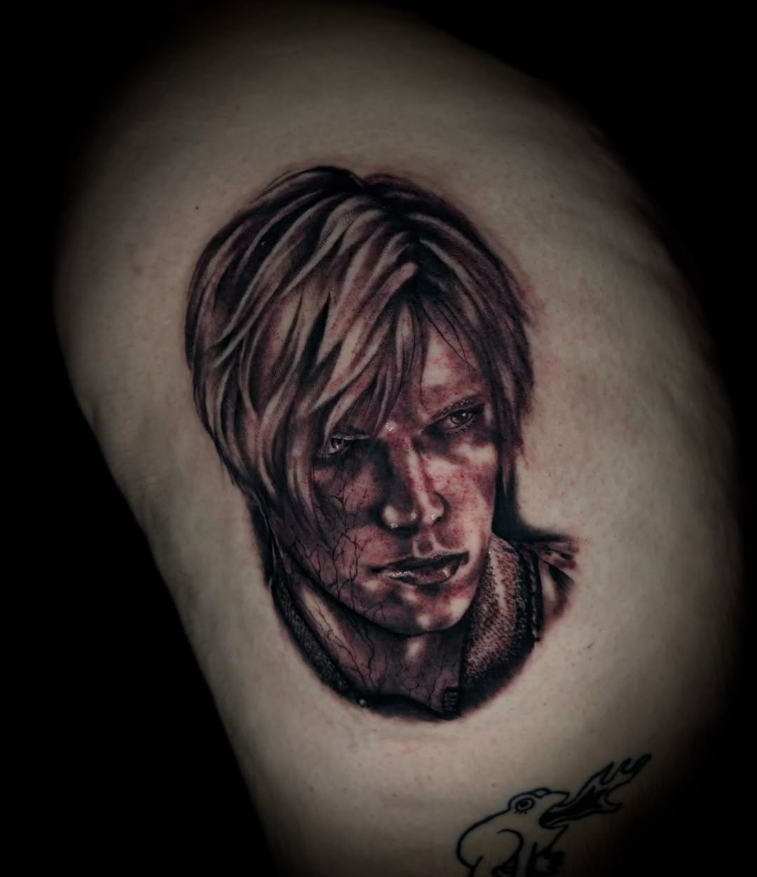 Portrait realism tattoo on the shoulder by Savannah Duff