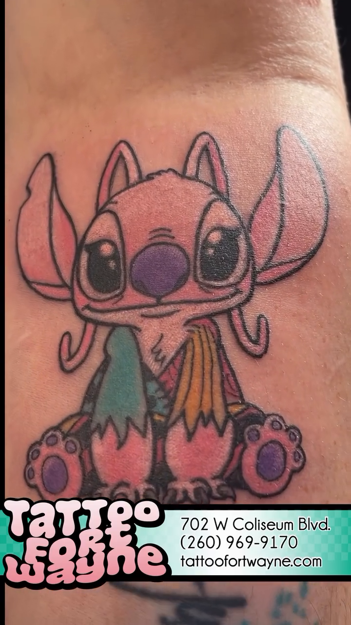 Stitch character new school tattoo on the forearm by Cortney "Fett" Fettinger, Fort Wayne, Indiana
