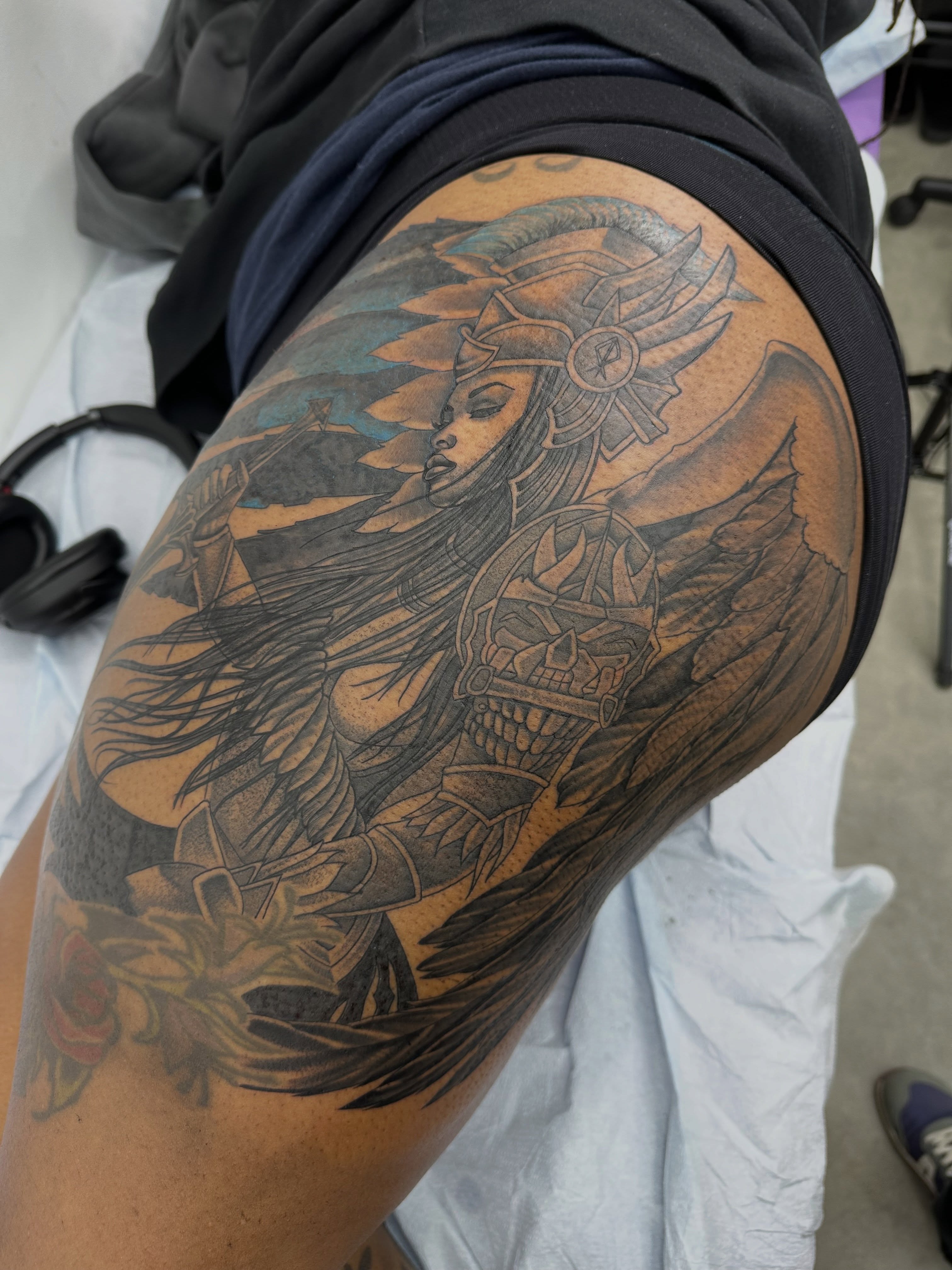 Warrior woman realism tattoo on the thigh by Nate Webb