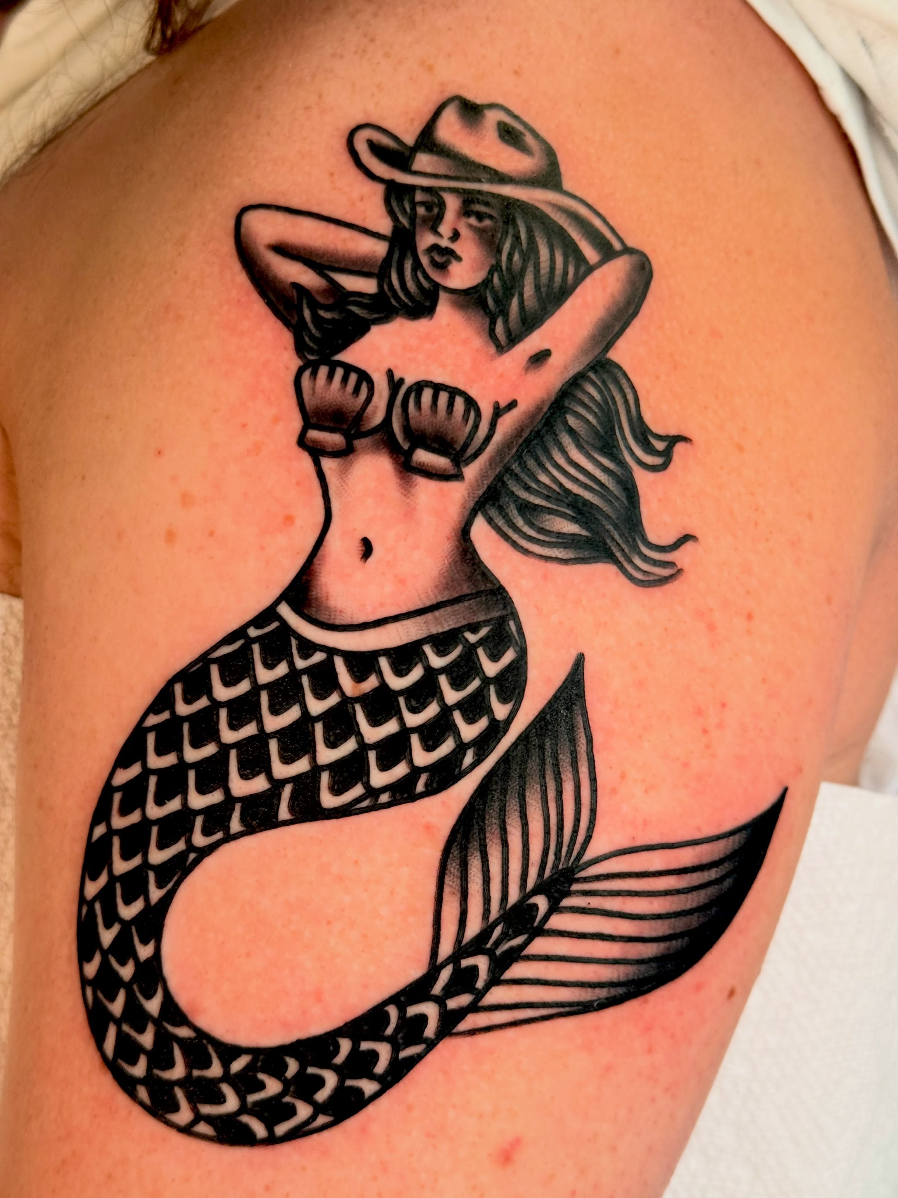 Mermaid American traditional tattoo on the shoulder by {{Theo Glanton}}