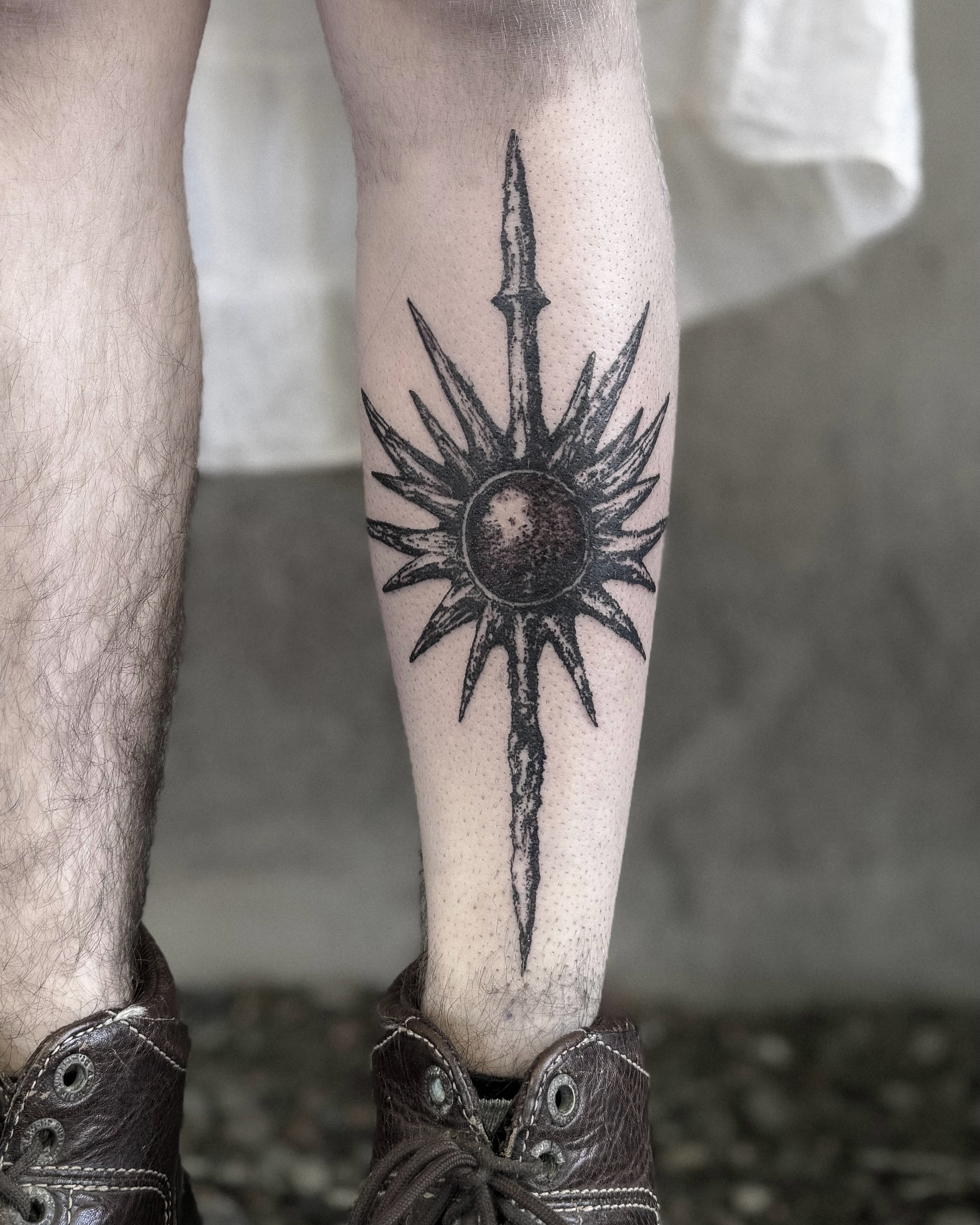 Sun and spear black and grey tattoo on the forearm by ąʑཞąıą ཞąıŋ