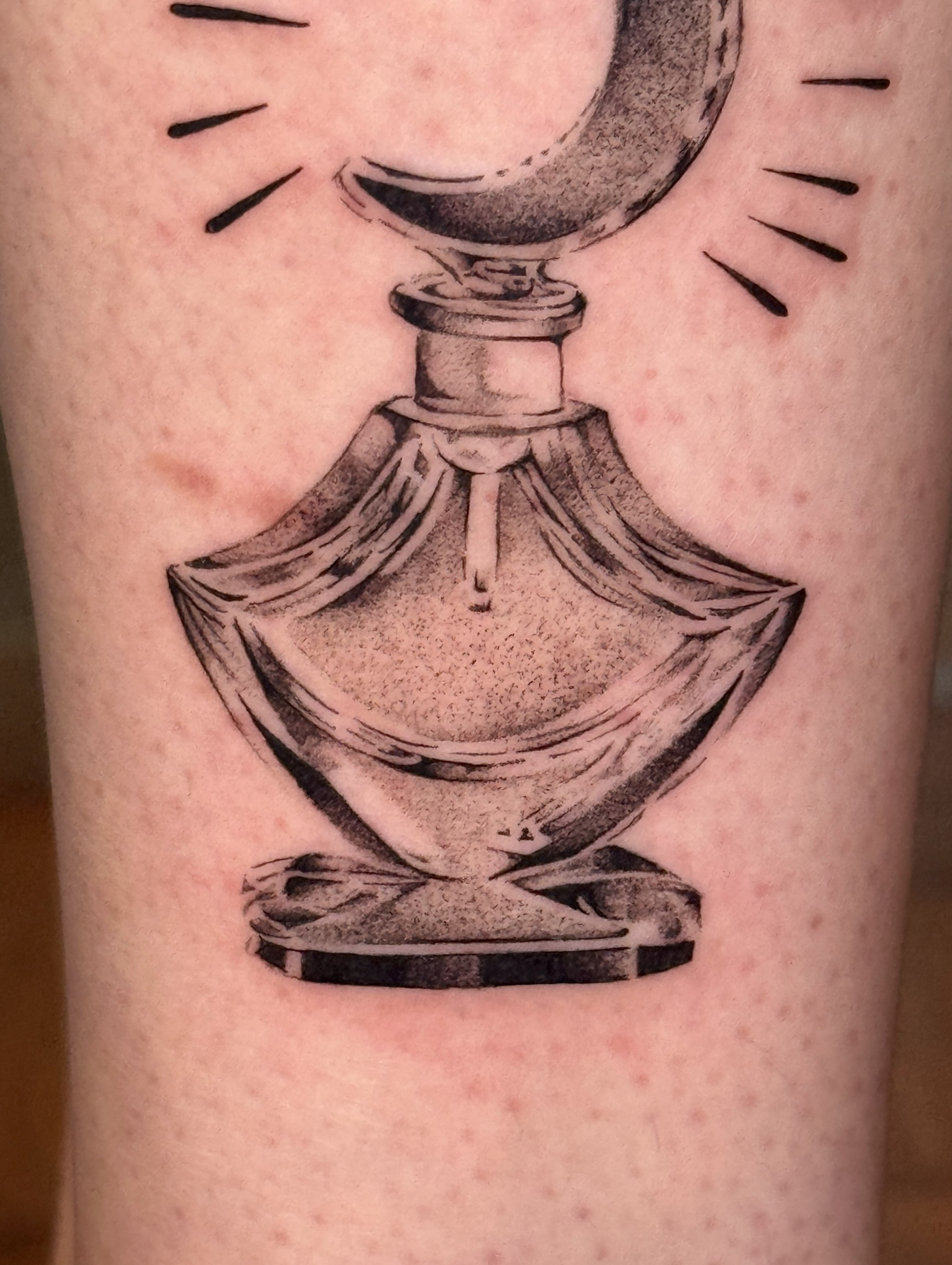 Perfume bottle black and grey tattoo on the forearm by tattoos by miss jackie o 🎱