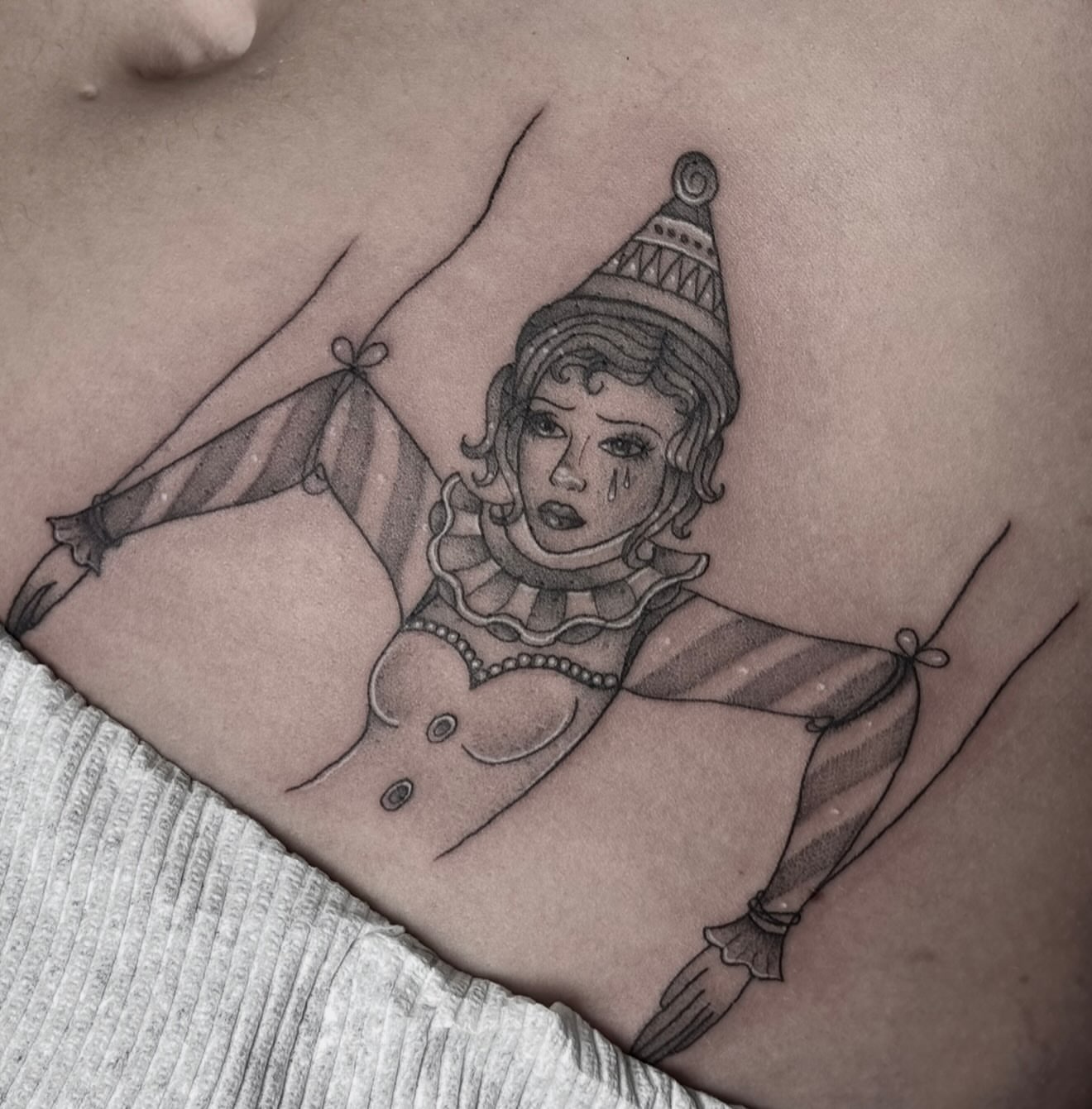 Clown black and grey tattoo on the chest by ππΌ Joana Diane Tattoos πΌπ