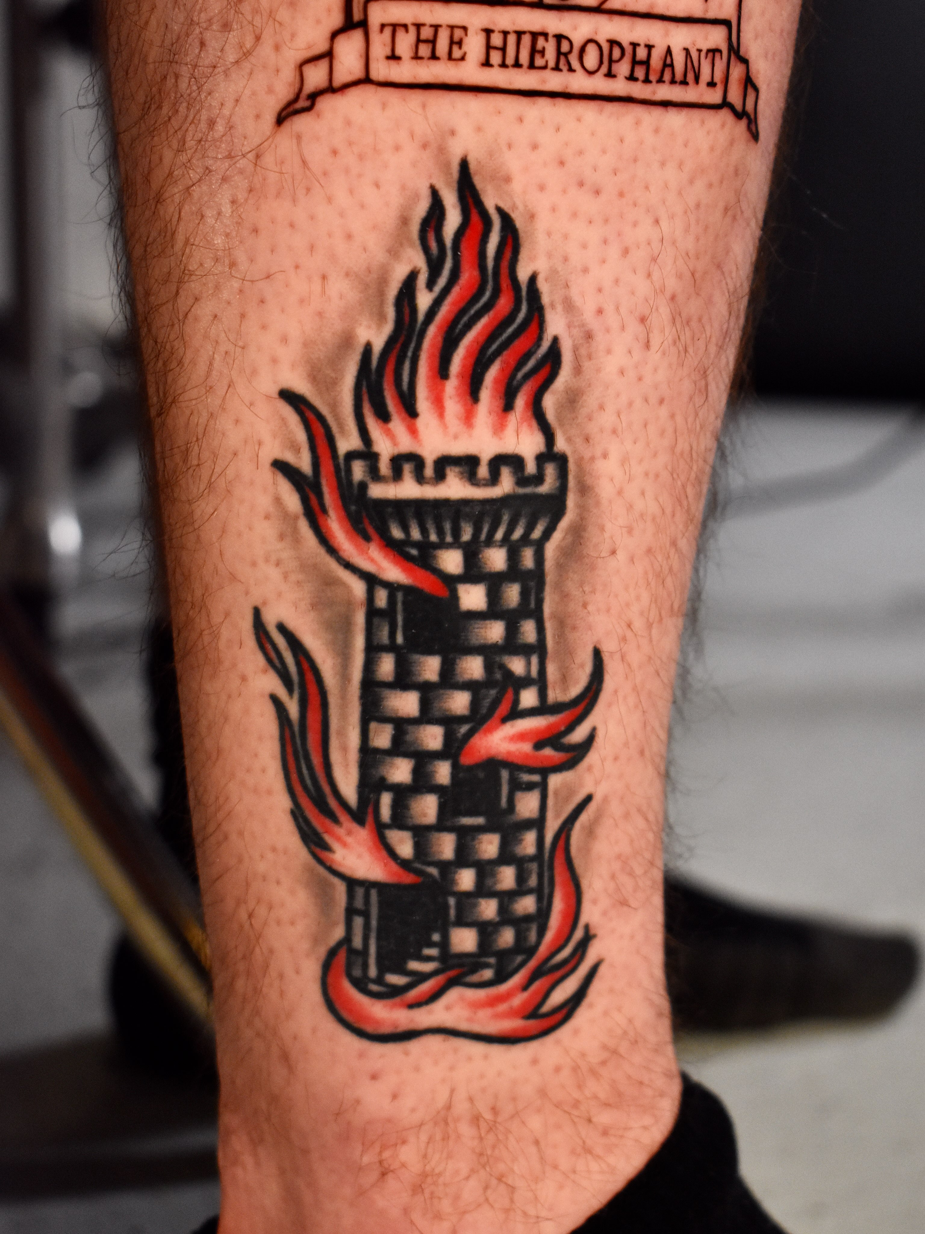 Torch with flames American traditional tattoo on the forearm by Mackz