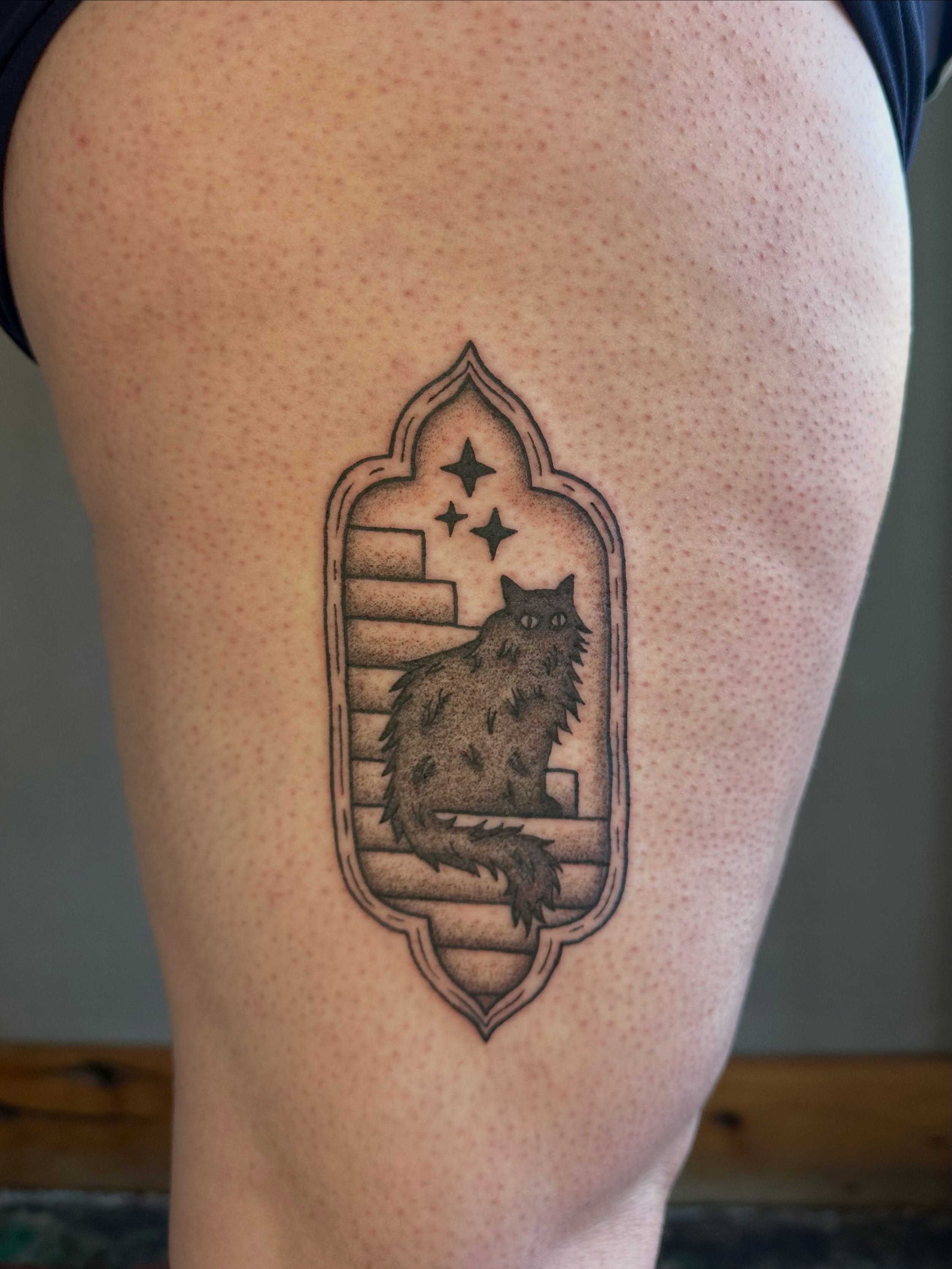 Cat on stairs black and grey tattoo on the thigh by Jadelin, San Francisco, California