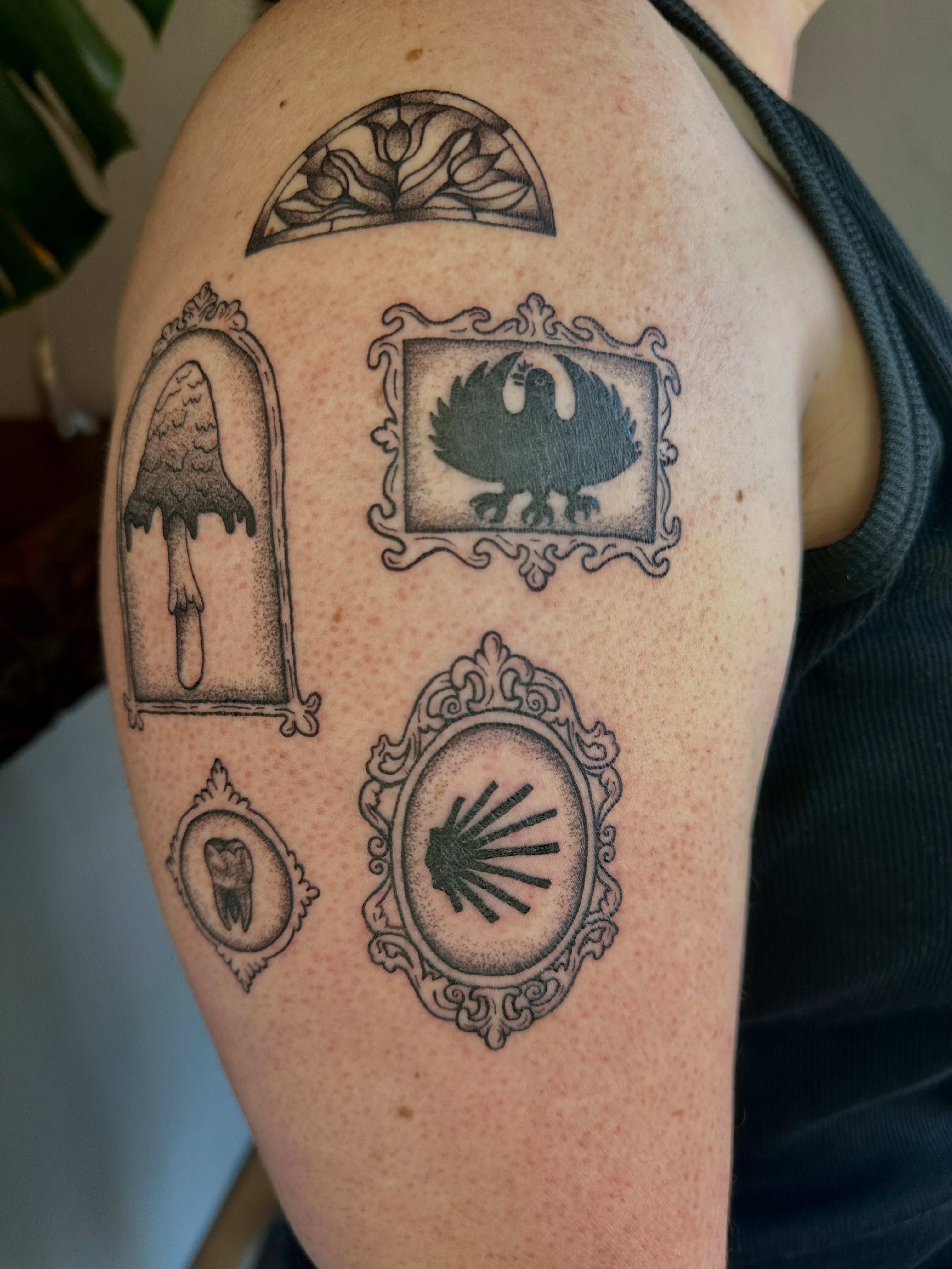Religious symbols black and grey tattoo on the shoulder by Jadelin, San Francisco, California