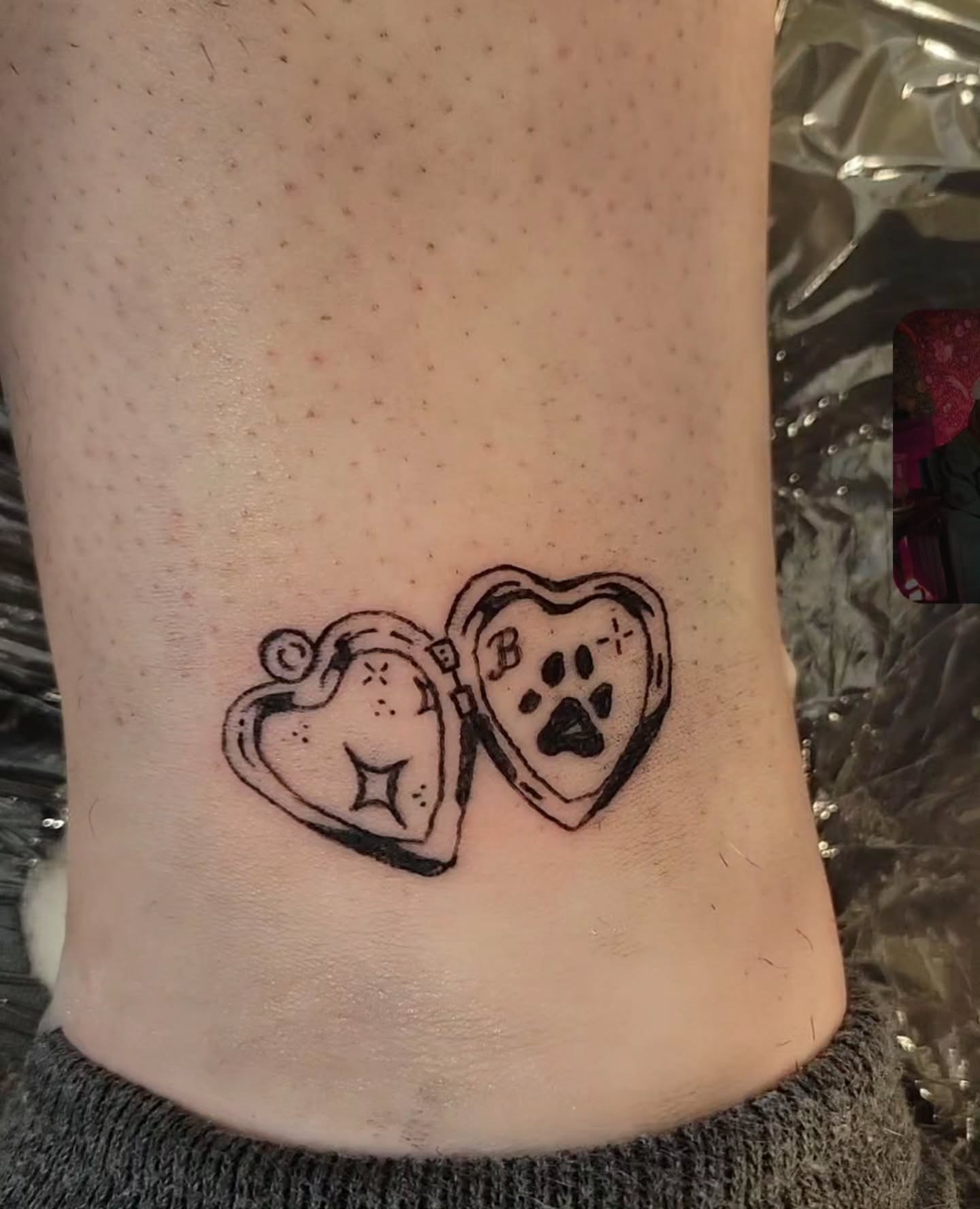 Heart lockets black and grey tattoo on the forearm by Bee
