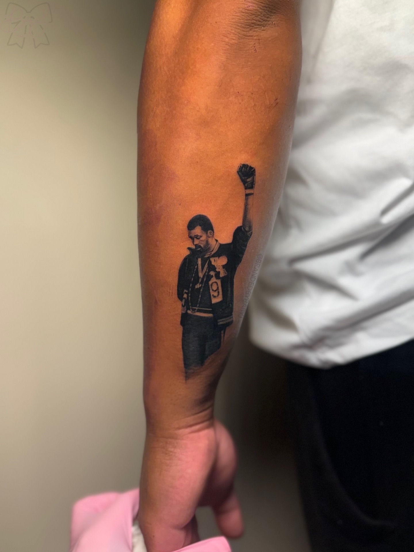 Man with raised fist realism tattoo on the forearm by 𝔹𝔸𝔹𝕐 𝕁 ♡, Cincinnati, Ohio