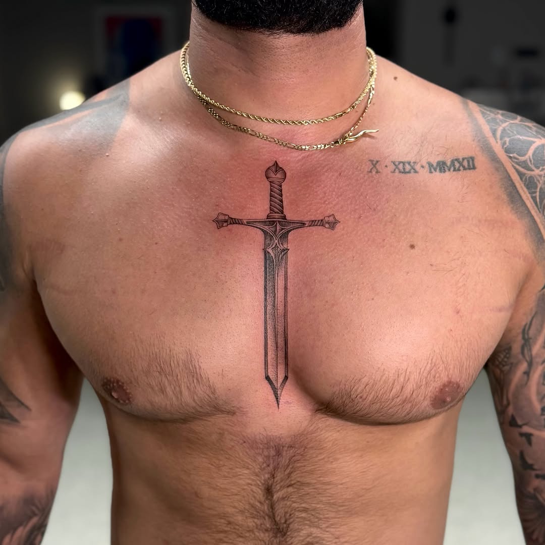 Sword black and grey tattoo on the chest by ๐๐๐๐ ๐๐๐๐