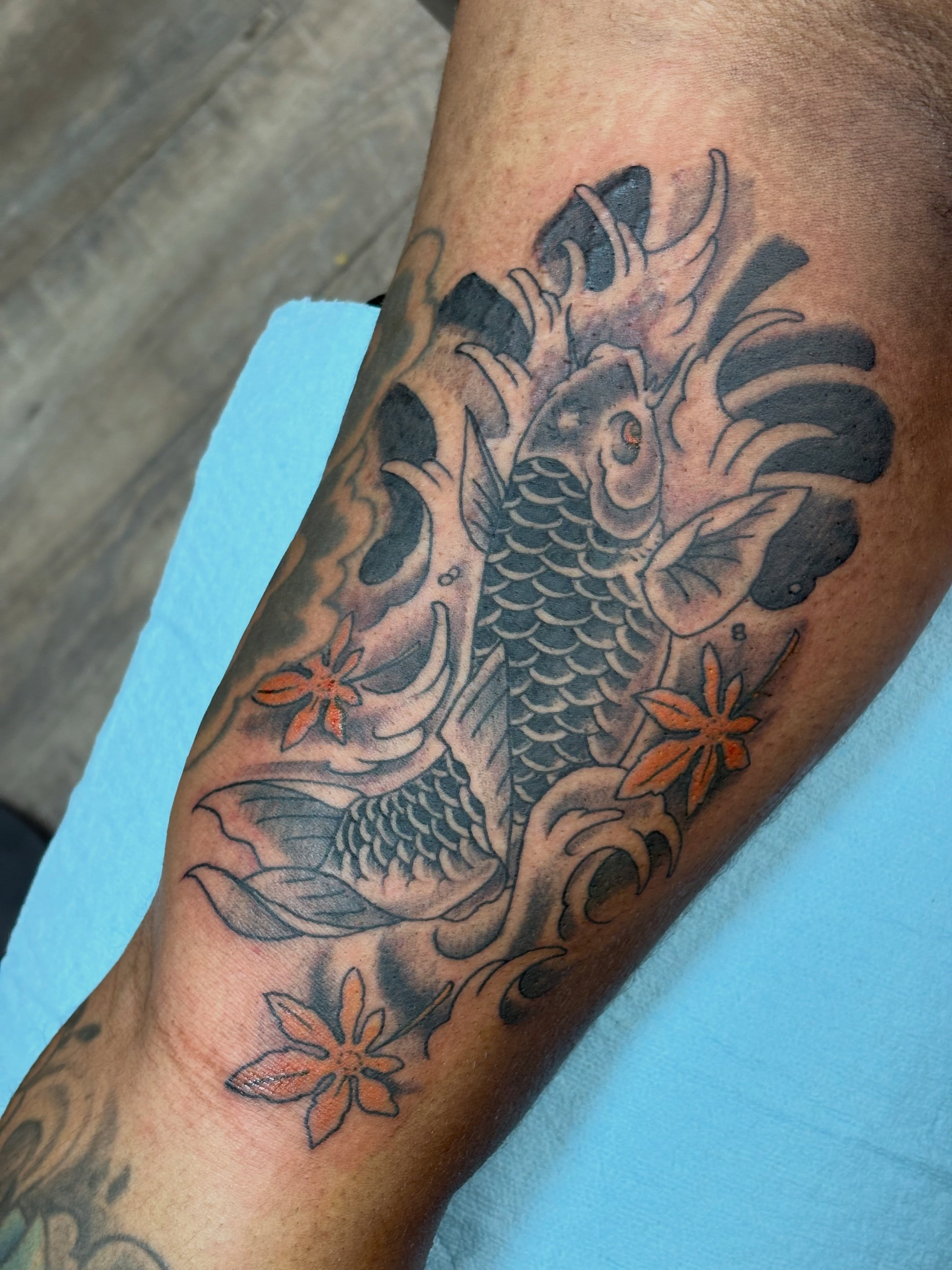Koi fish japanese irezumi tattoo on the forearm by Jason Allen, Avondale, Arizona